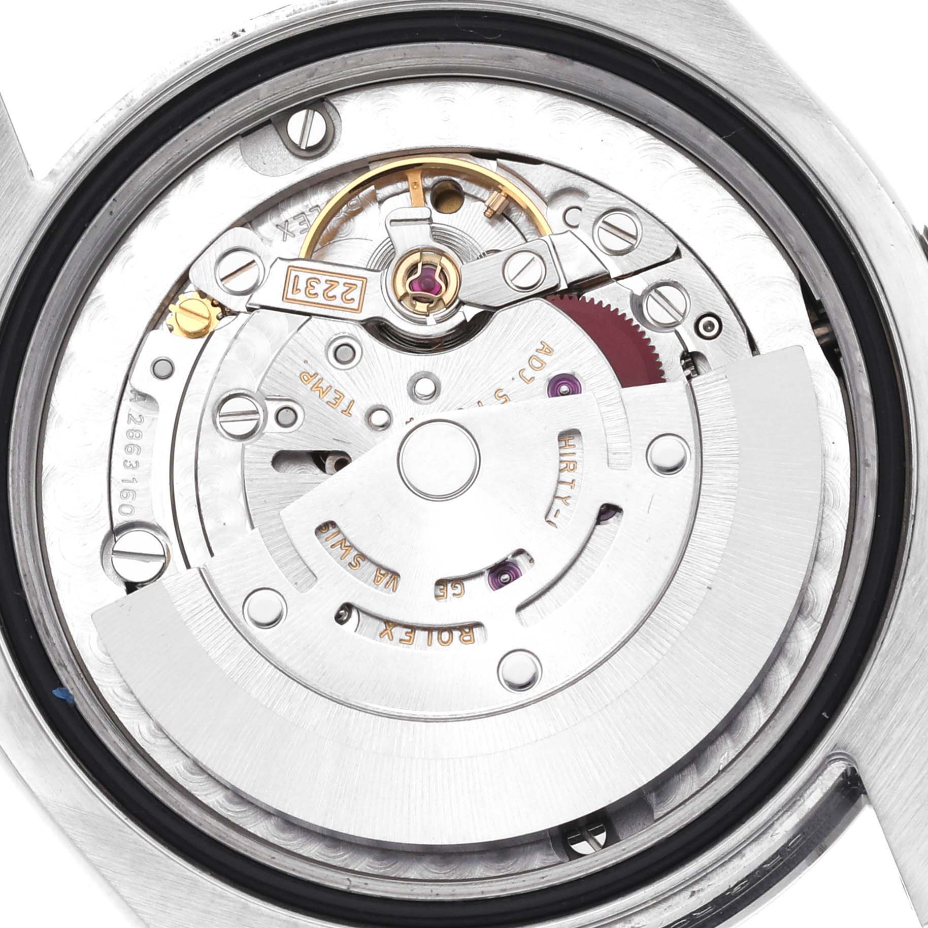 The image shows the internal movement of a Rolex Mid-Size 177200 Women's Stainless Steel Black Dial 177200 Women's Stainless Steel Black Dial watch from a top-down angle, highlighting gears and mechanisms.