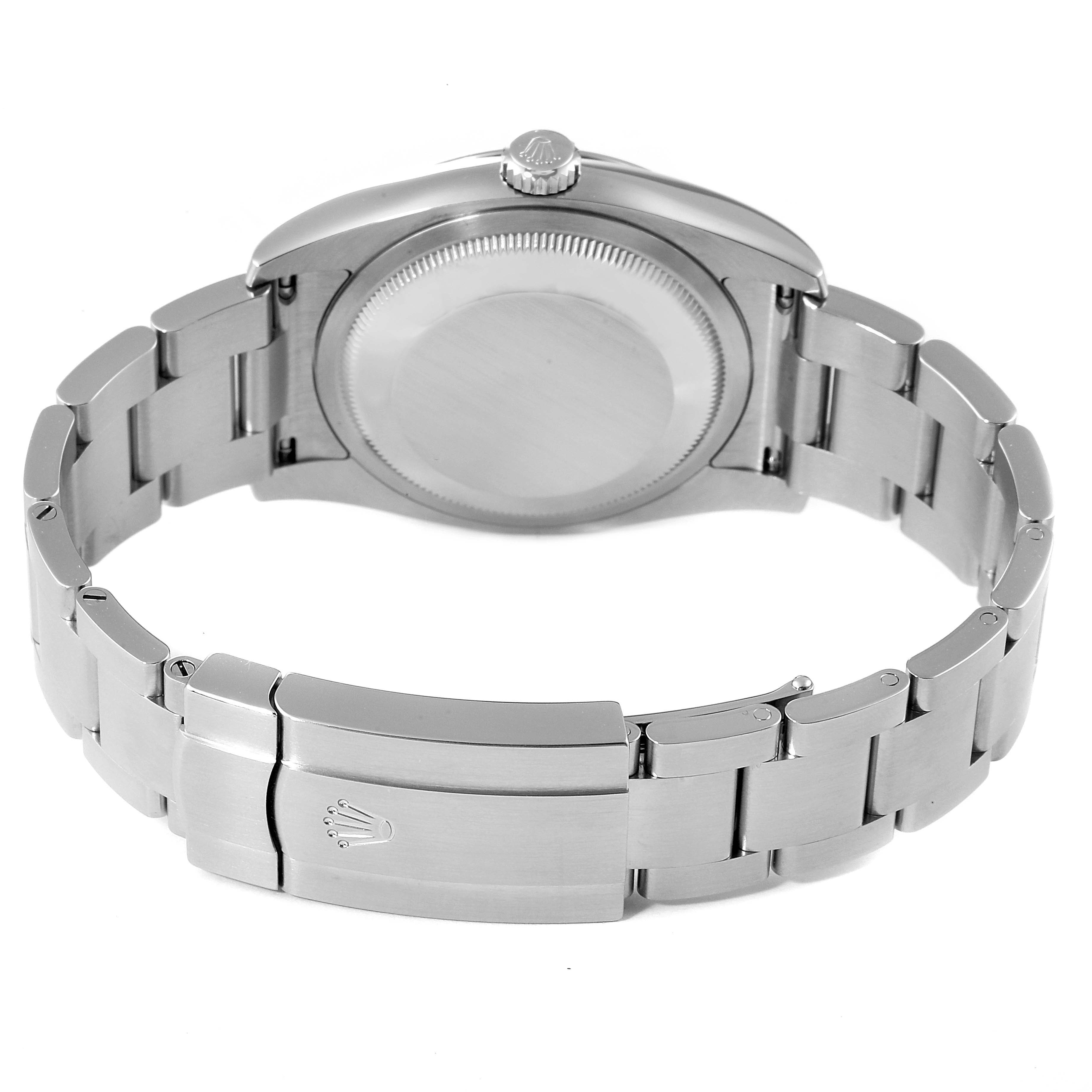 The image shows the back and clasp of a Rolex Oyster Perpetual 116000 Men
s Stainless Steel Black Dial 116000 Men
s Stainless Steel Black Dial watch, highlighting the bracelet and case back.