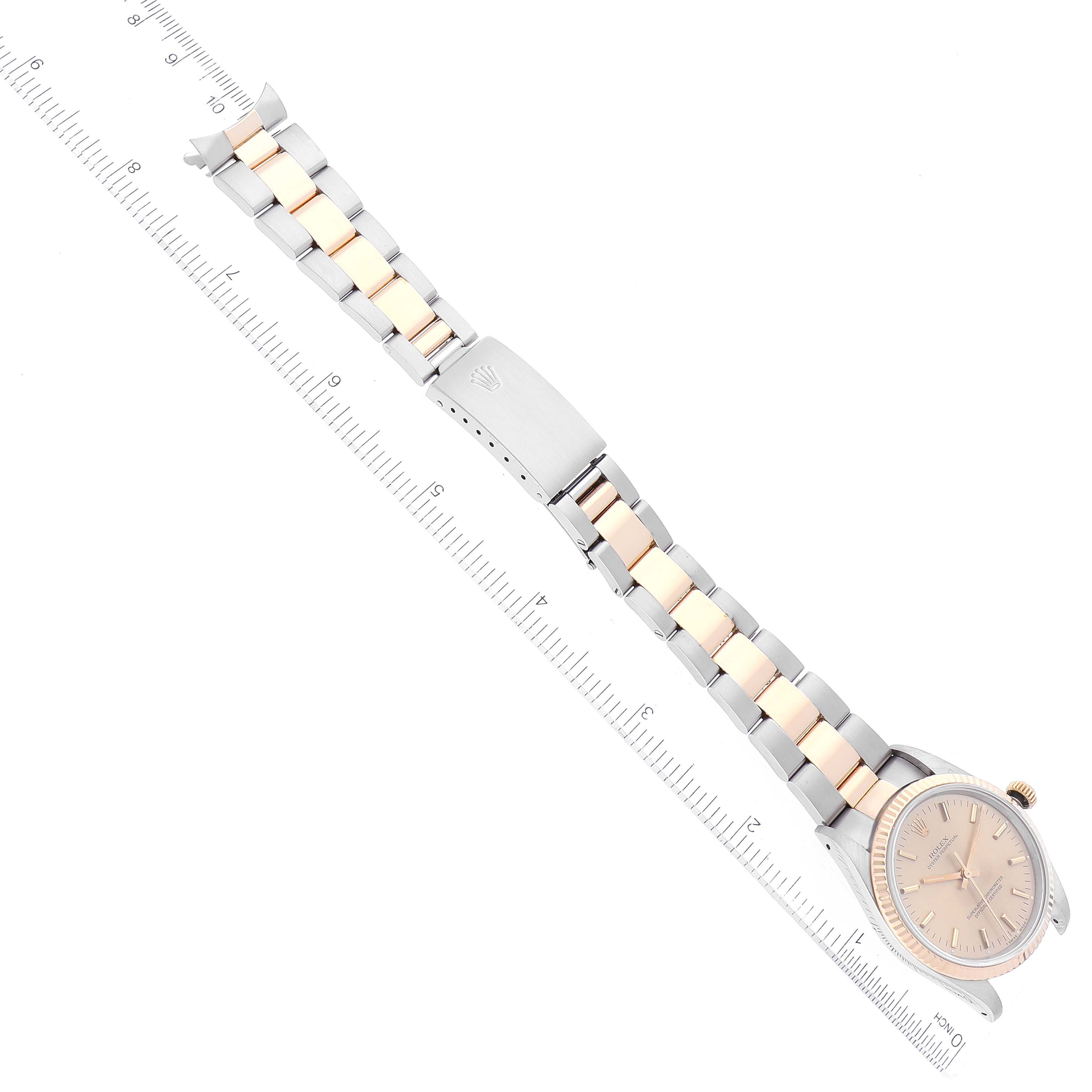 The image shows a top-down view of a Rolex Oyster Perpetual 14233 Men's Stainless Steel Champagne Dial 14233 Men's Stainless Steel Champagne Dial watch, highlighting its face, bezel, bracelet, and clasp.