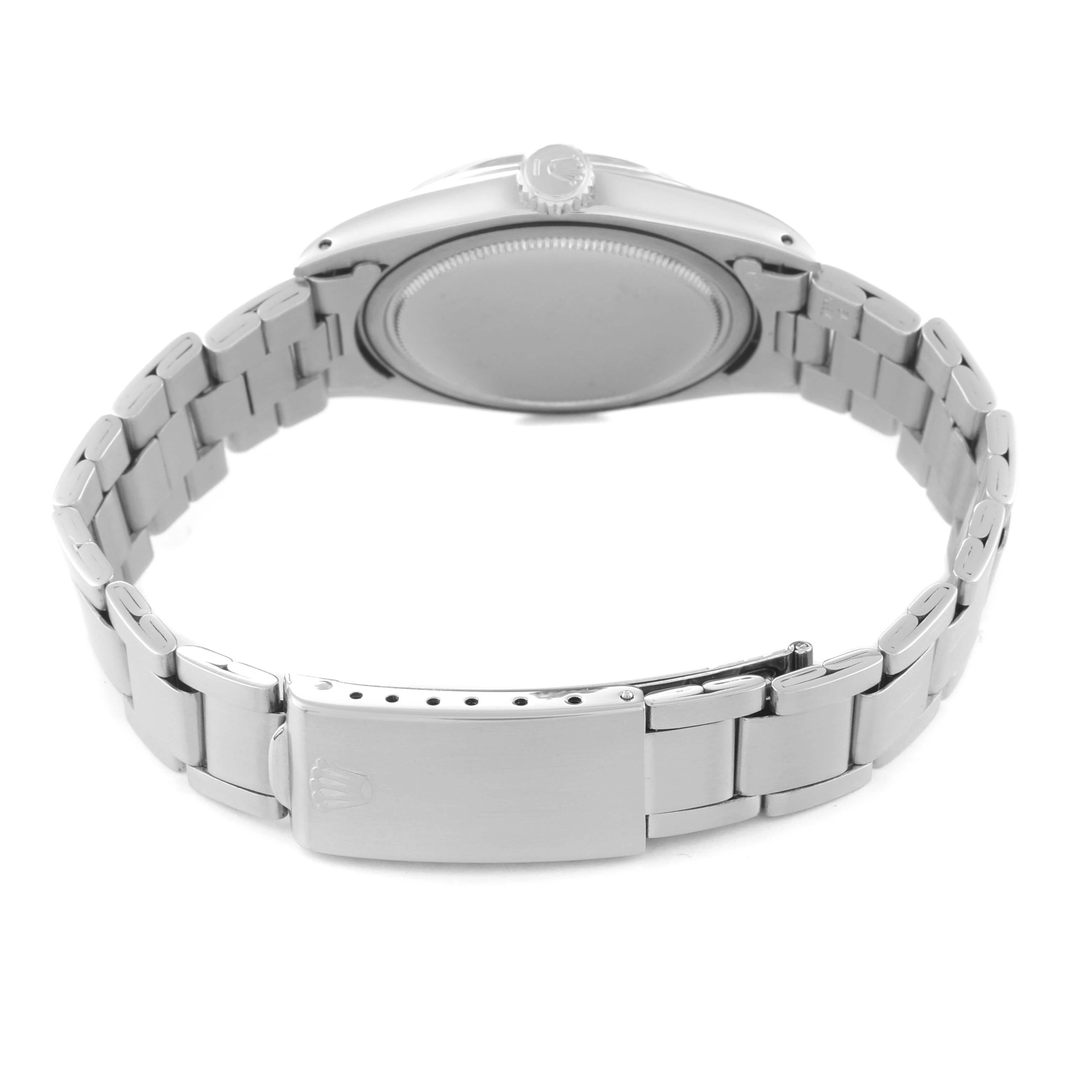The image shows the back and side of the Rolex Vintage Collection 6427 Men's Stainless Steel Silver Dial watch, including the case, crown, and bracelet clasp.