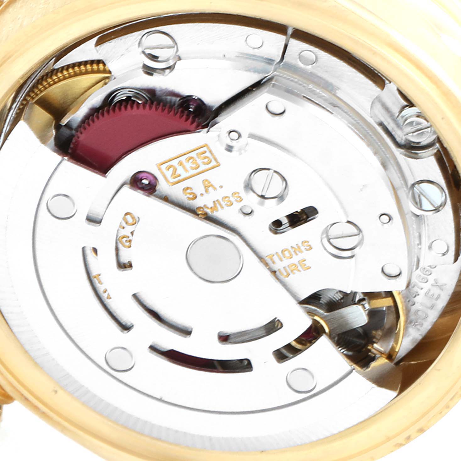 Close-up of the Rolex President 69288 Women
s White Gold Champagne Dial 69288 Women
s White Gold Champagne Dial model
s movement mechanism, showcasing intricate gears and components.