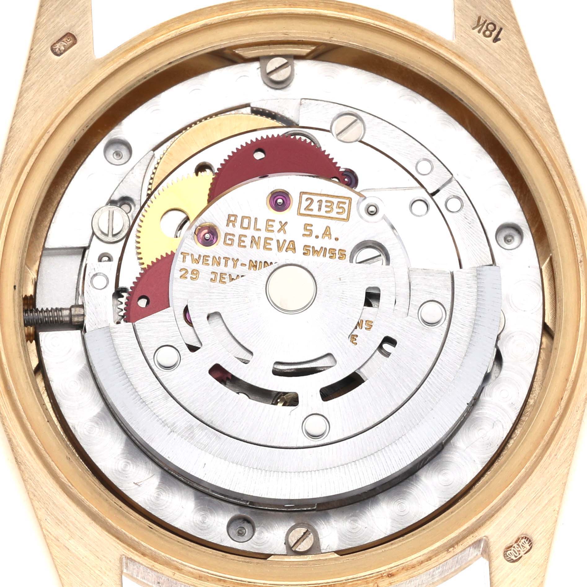 The image shows the internal mechanism of a Rolex President 68278 Women's Yellow Gold White Dial 68278 Women's Yellow Gold White Dial watch, highlighting gears, jewels, and the rotor, viewed from the back.