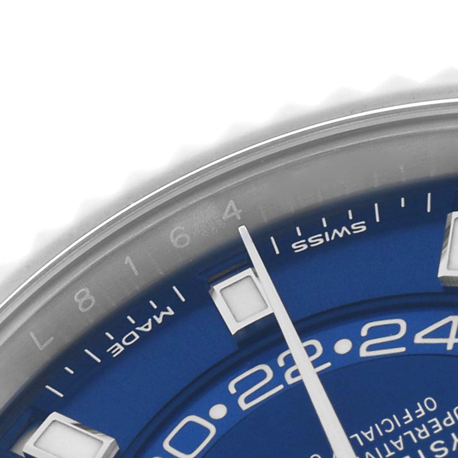 The image shows a close-up of the Rolex Sky-Dweller 326934 Men's Stainless Steel Blue Dial's blue dial with hour markers and part of the bezel.
