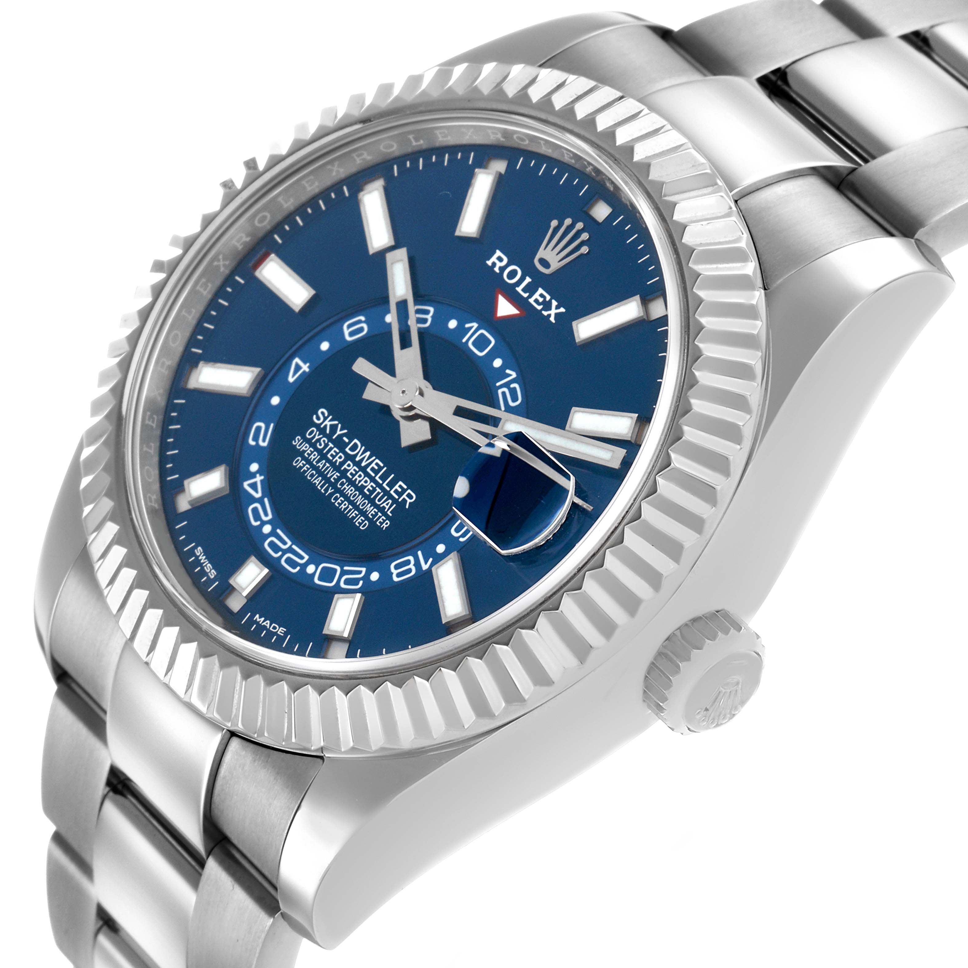 The Rolex Sky-Dweller 326934 Men's Stainless Steel Blue Dial watch is shown at a tilted angle, displaying the blue dial, bezel, and part of the bracelet.