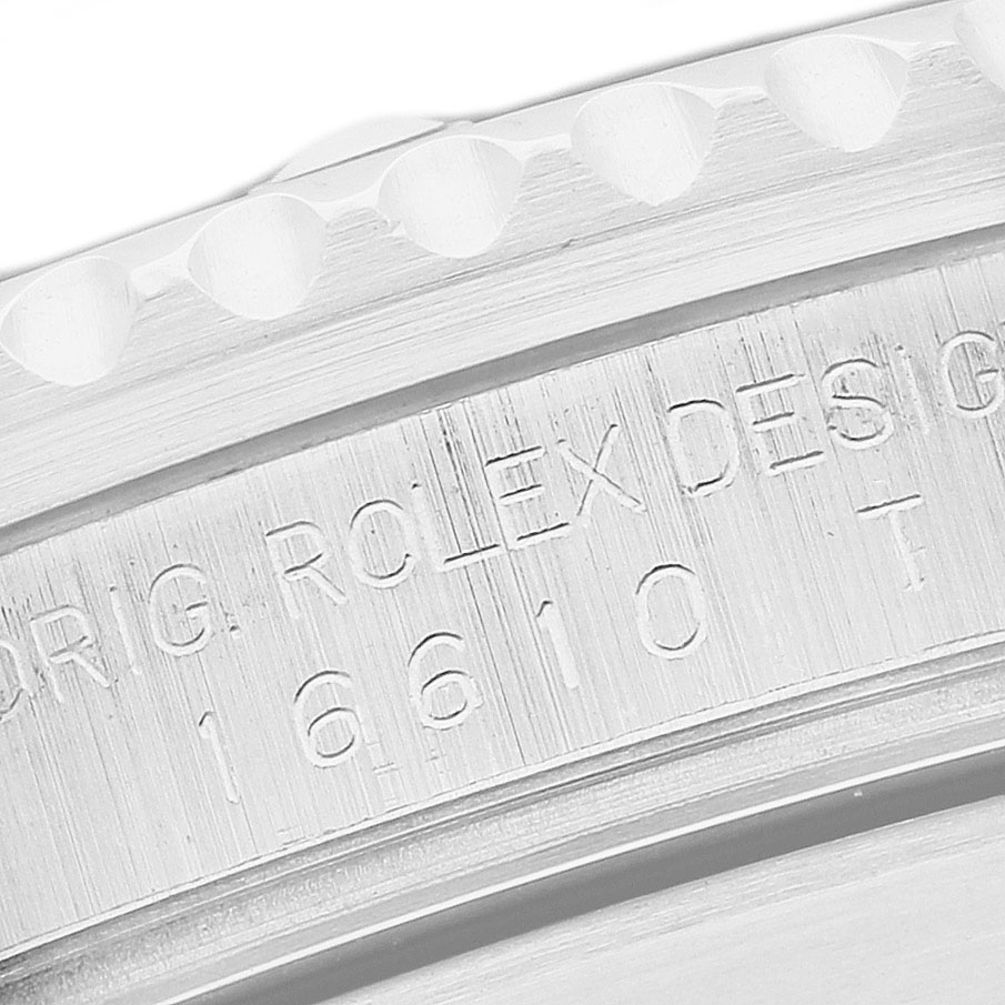 The image shows a close-up of the side engraving on a Rolex Submariner 16610 Men's Stainless Steel Black Dial, highlighting its model number.