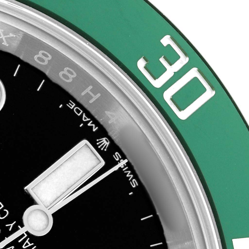 The image shows a close-up of the Rolex Submariner 126610LV Men's Stainless Steel Black Dial's bezel and part of the dial, highlighting the "30" marker and an hour hand.