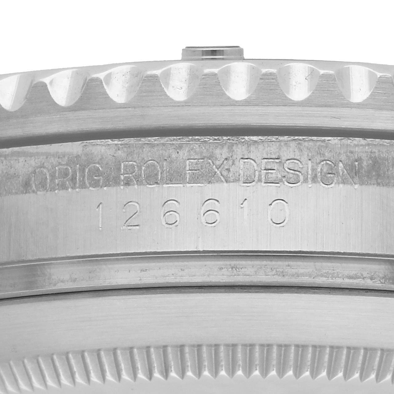 The image shows a close-up of the side of a Rolex Submariner 126610LV Men's Stainless Steel Black Dial watch, featuring the engraved model number.