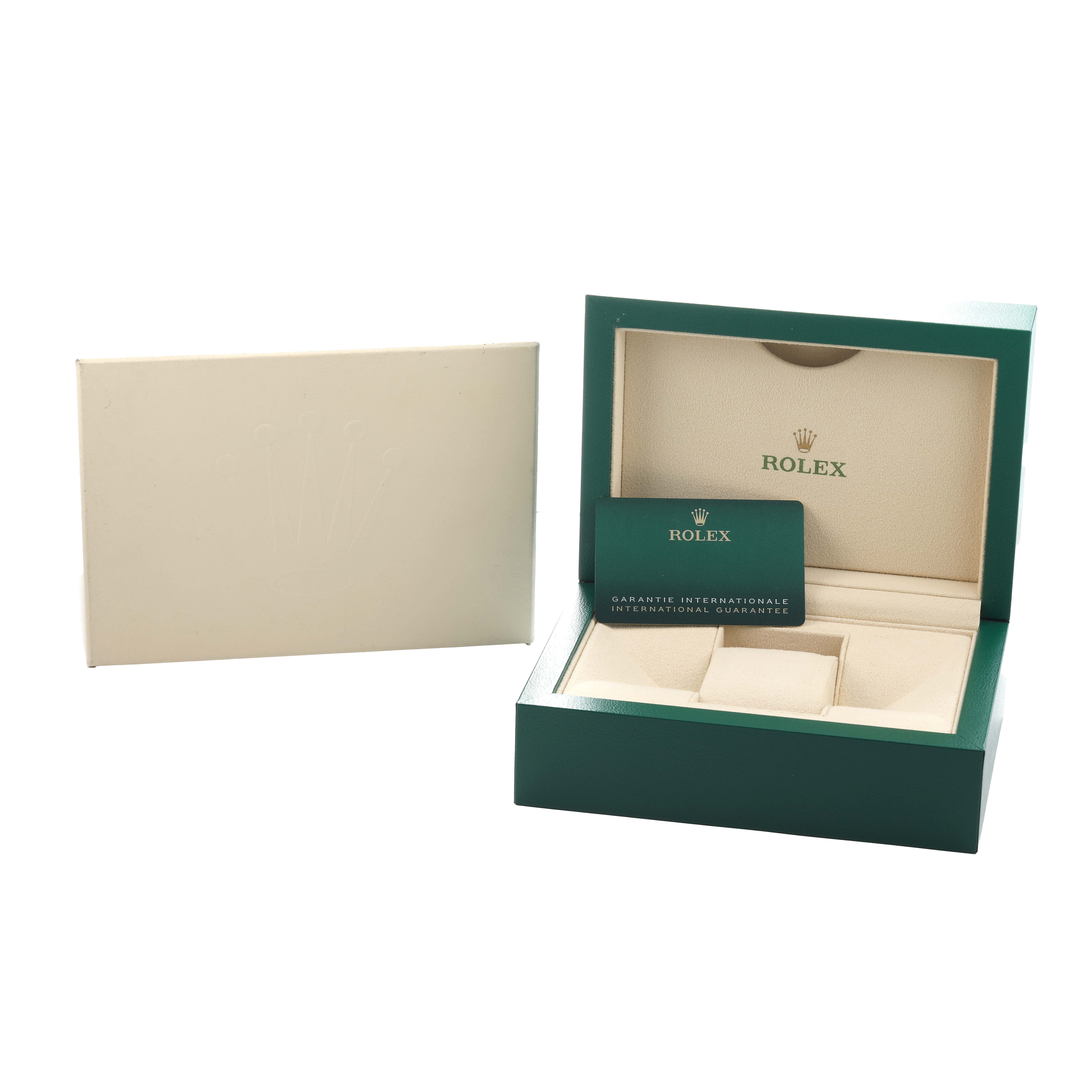 The image shows a Rolex Submariner 126610 Men's Stainless Steel Black Dial box and warranty card, with the box open and positioned at an angle.