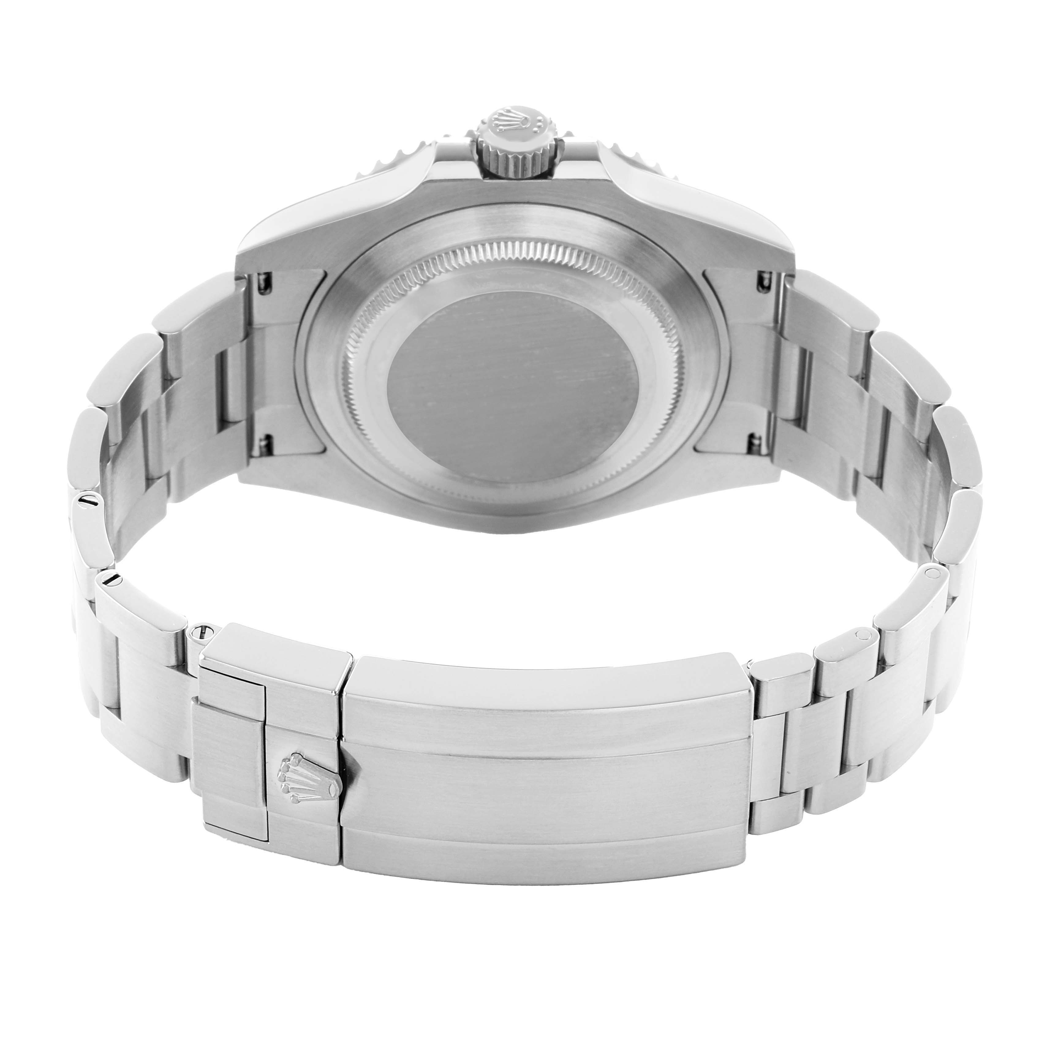 The image shows the backside of the Rolex Submariner 126610 Men's Stainless Steel Black Dial watch, focusing on the case back and bracelet clasp.