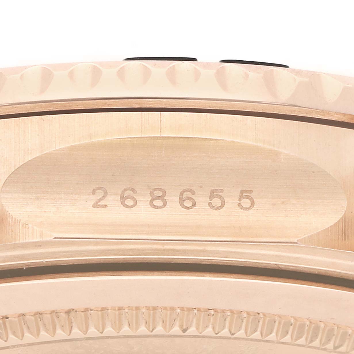 The image shows a close-up of the side view of the Rolex Yacht-Master 268655 Men's Rose Gold Black Dial, highlighting the model number engraving.