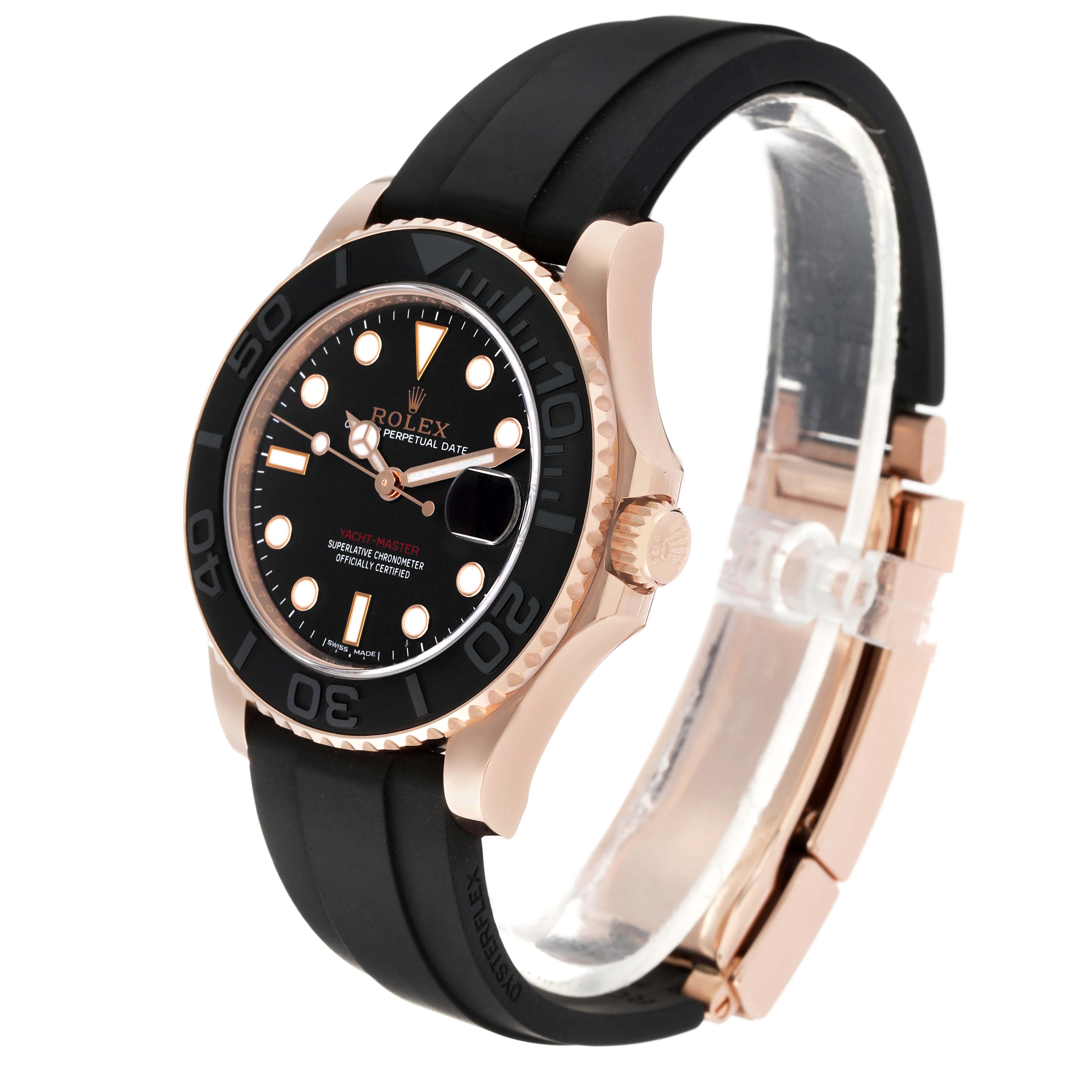 The Rolex Yacht-Master 268655 Men's Rose Gold Black Dial watch is shown at a slight angle, featuring the dial, bezel, crown, and black strap.