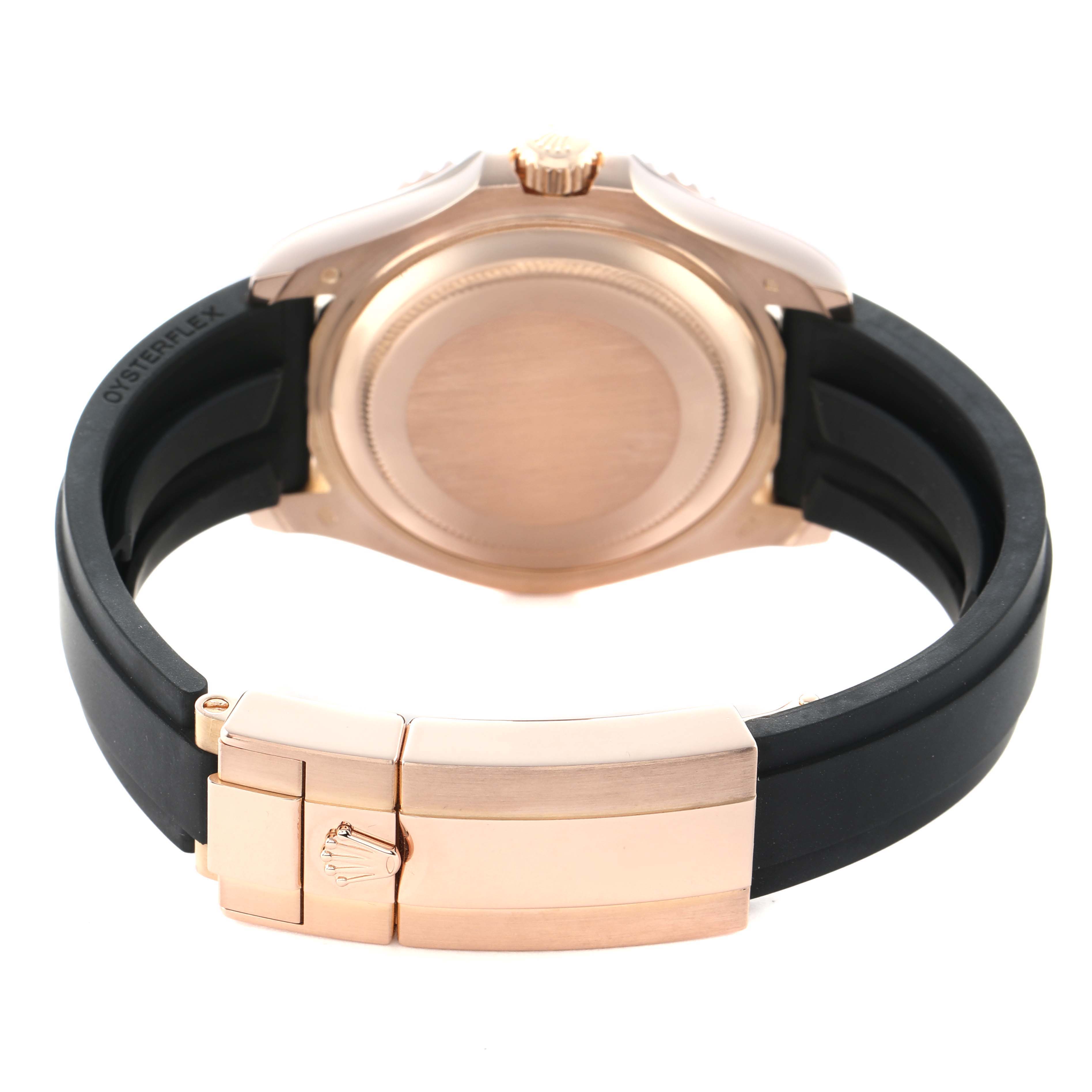 The Rolex Yacht-Master 268655 Men's Rose Gold Black Dial watch is shown from the back, highlighting the clasp, oysterflex strap, and case back.