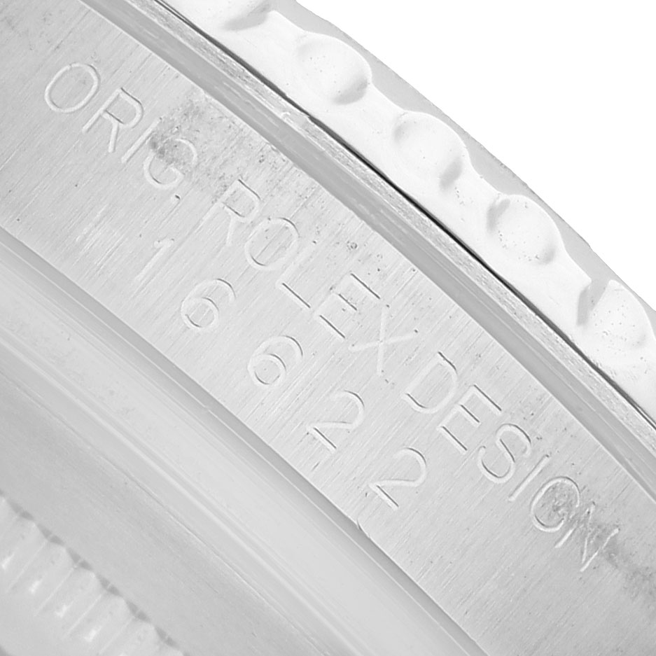 The image shows a close-up of the inner bezel of a Rolex Yacht-Master 16622 Men's Stainless Steel Silver Dial, featuring engraved text.
