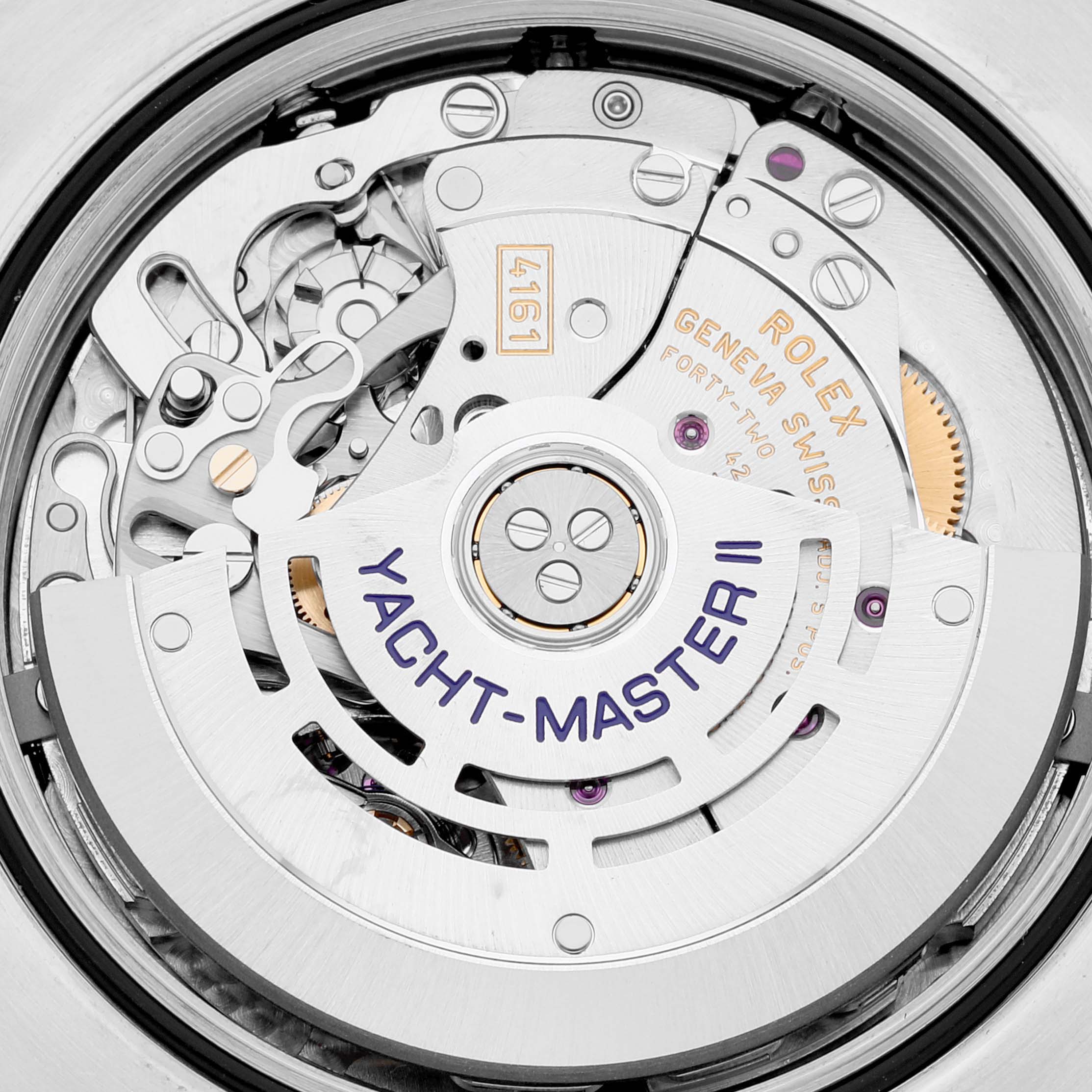 The image shows a close-up of the mechanism and internal components of the Rolex Yacht-Master 116680 Men
s Stainless Steel White Dial 116680 Men
s Stainless Steel White Dial II watch.