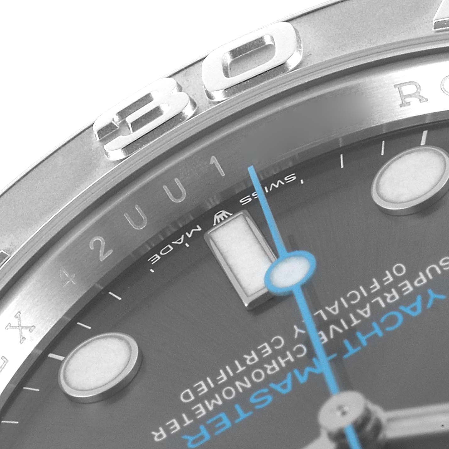 Close-up of a Rolex Yacht-Master 126622 Men
s Stainless Steel Grey Dial 126622 Men
s Stainless Steel Grey Dial watch face showing the bezel, part of the dial, and hands.