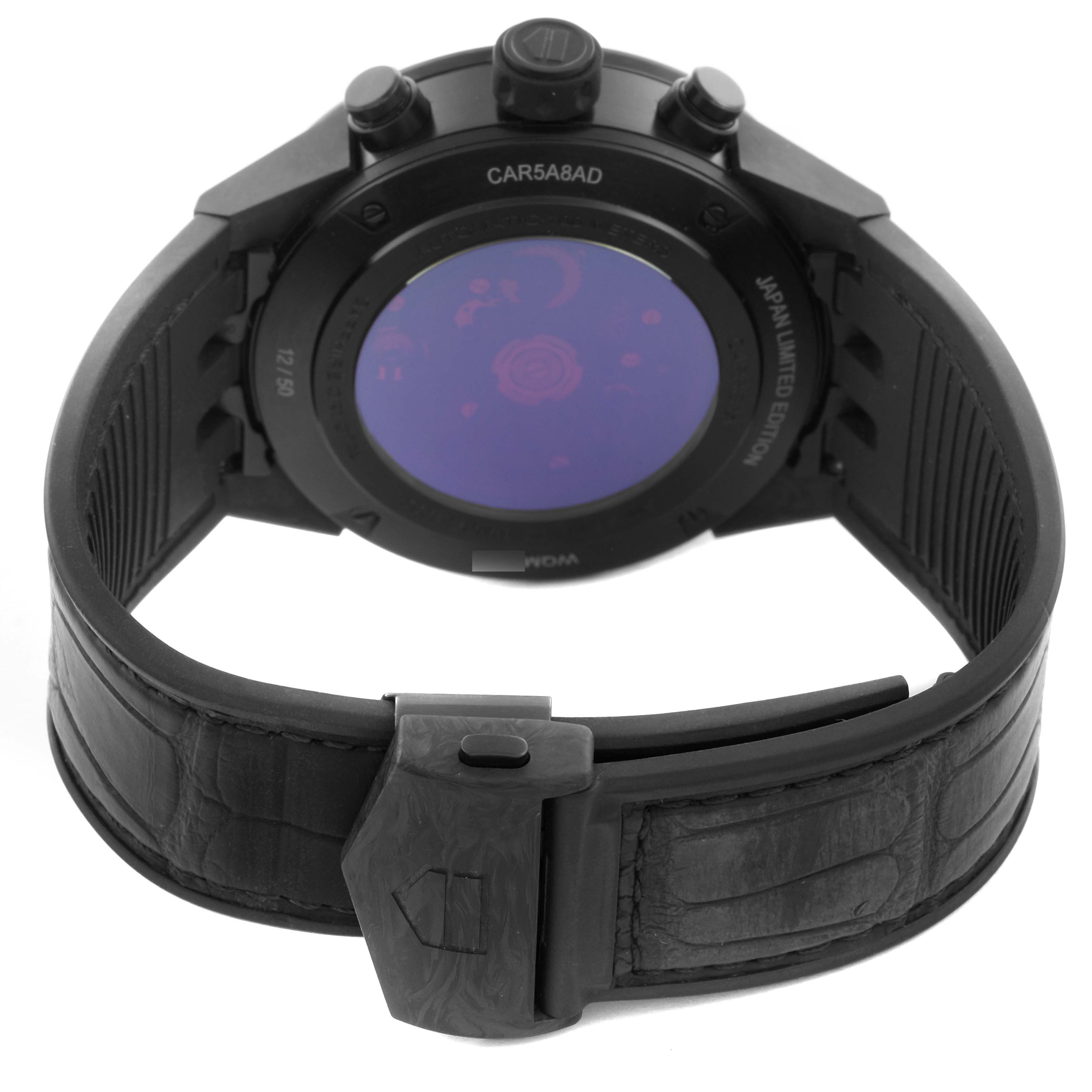 The Tag Heuer Carrera CAR5A8AD Men
s Titanium Black Dial CAR5A8AD Men
s Titanium Black Dial watch is shown from the back, highlighting the strap, case back, and clasp.