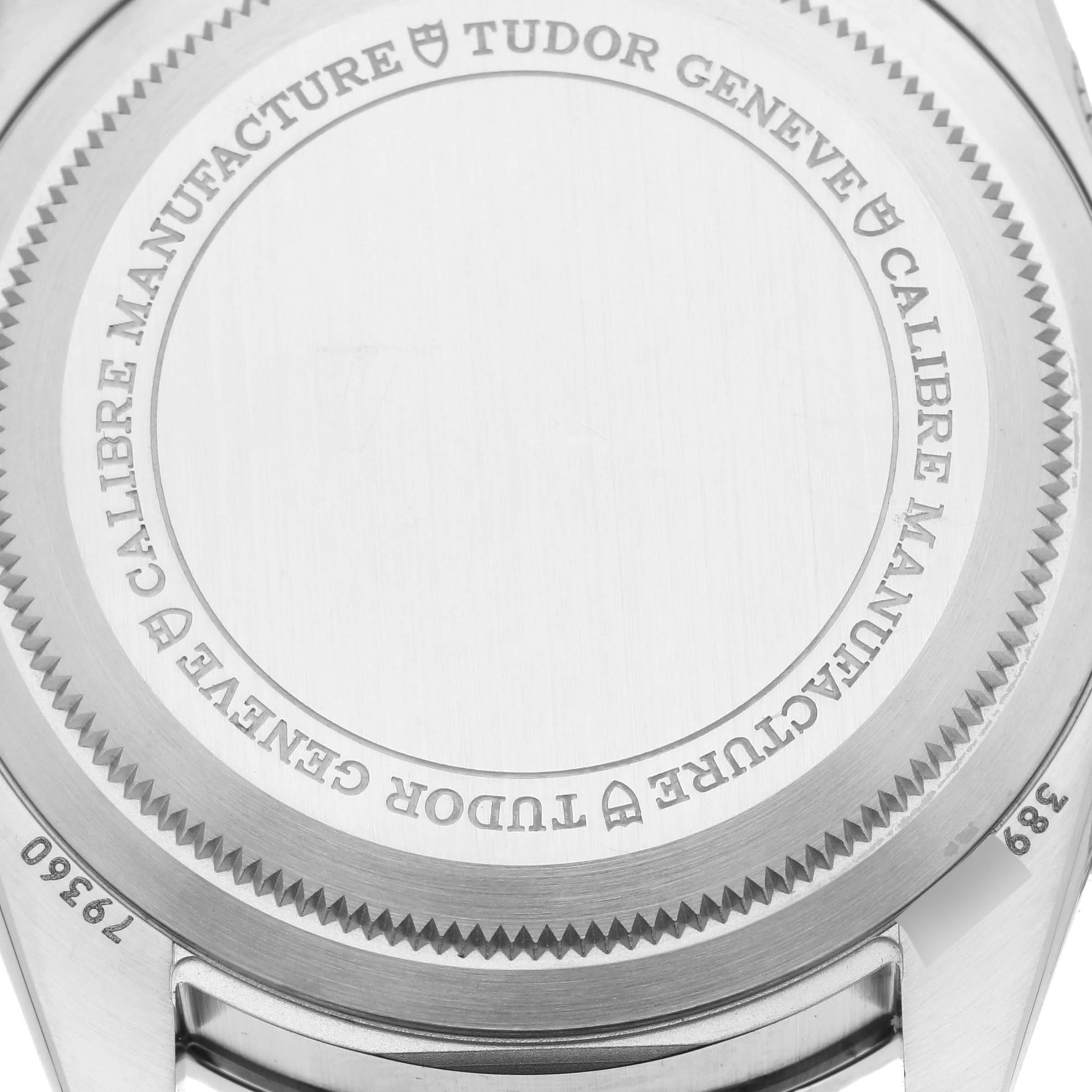 The image shows the back case of the Tudor Heritage Black Bay watch, focusing on its engraved details.