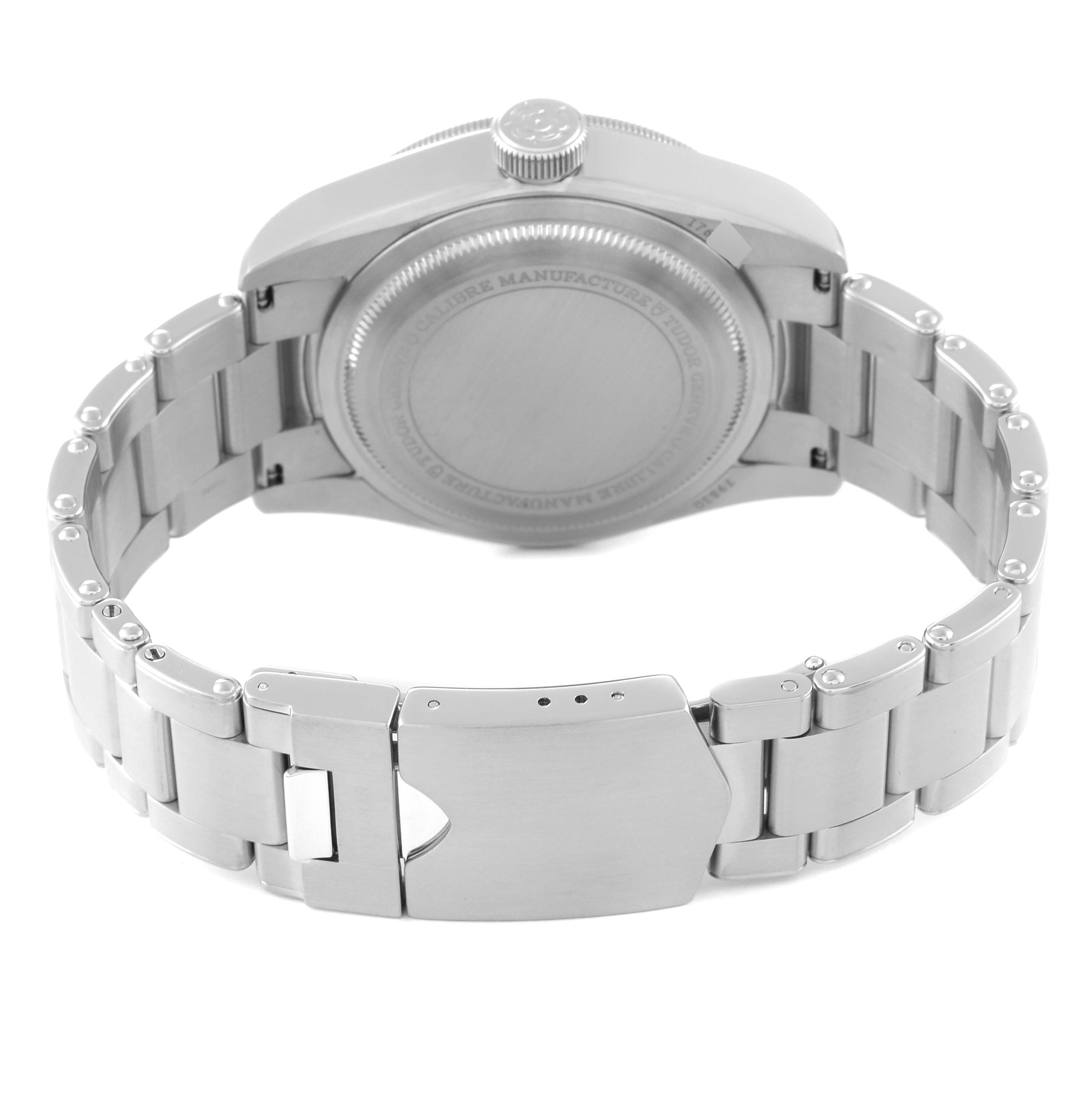 The image shows the back and clasp of a Tudor Heritage Black Bay 79830RB Men
s Stainless Steel Black Dial 79830RB Men
s Stainless Steel Black Dial watch, highlighting the bracelet and case back.
