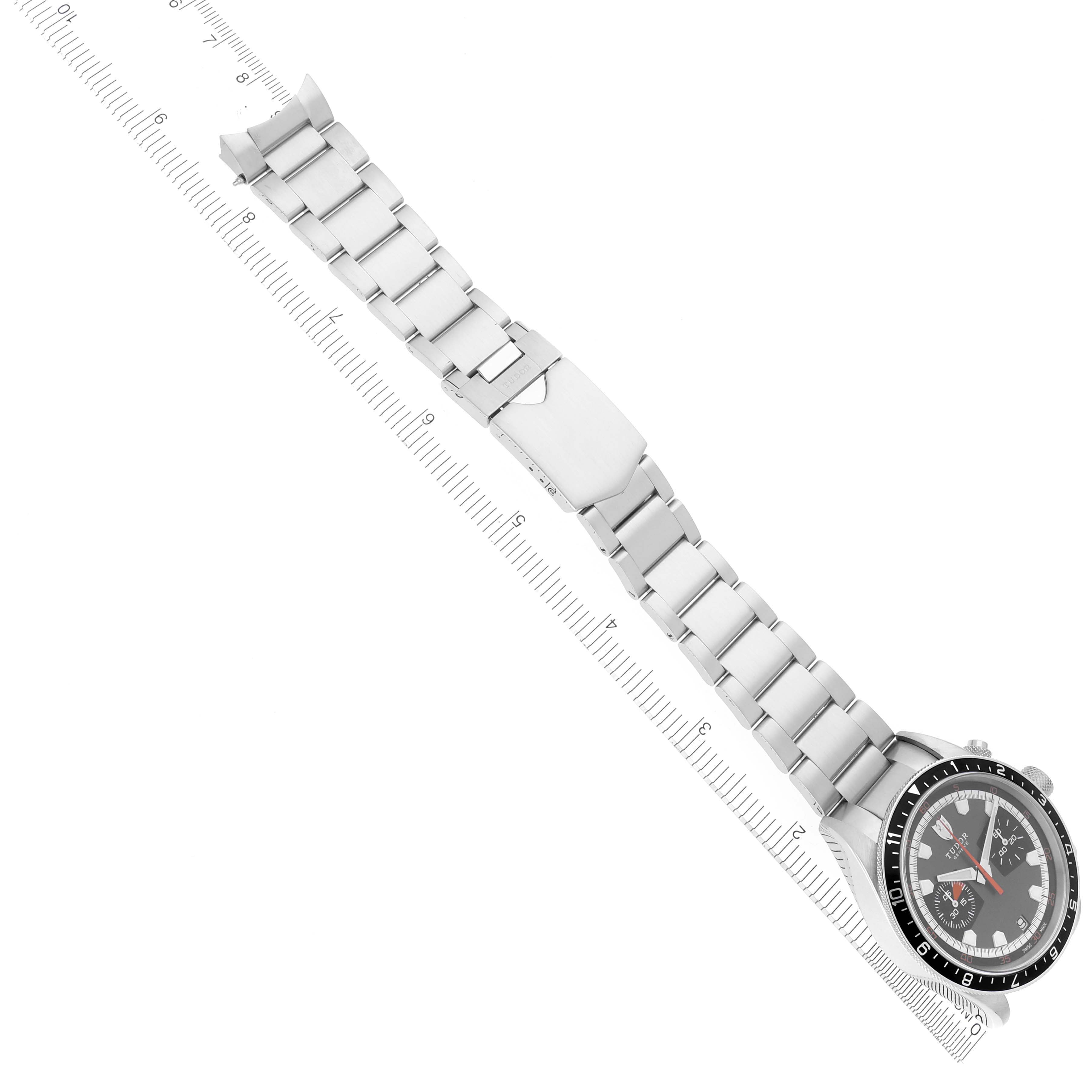 The Tudor Heritage Chrono 70330N Men's Stainless Steel Grey Dial 70330N Men's Stainless Steel Grey Dial watch is shown from a top view, displaying the full stainless steel bracelet and clasp.