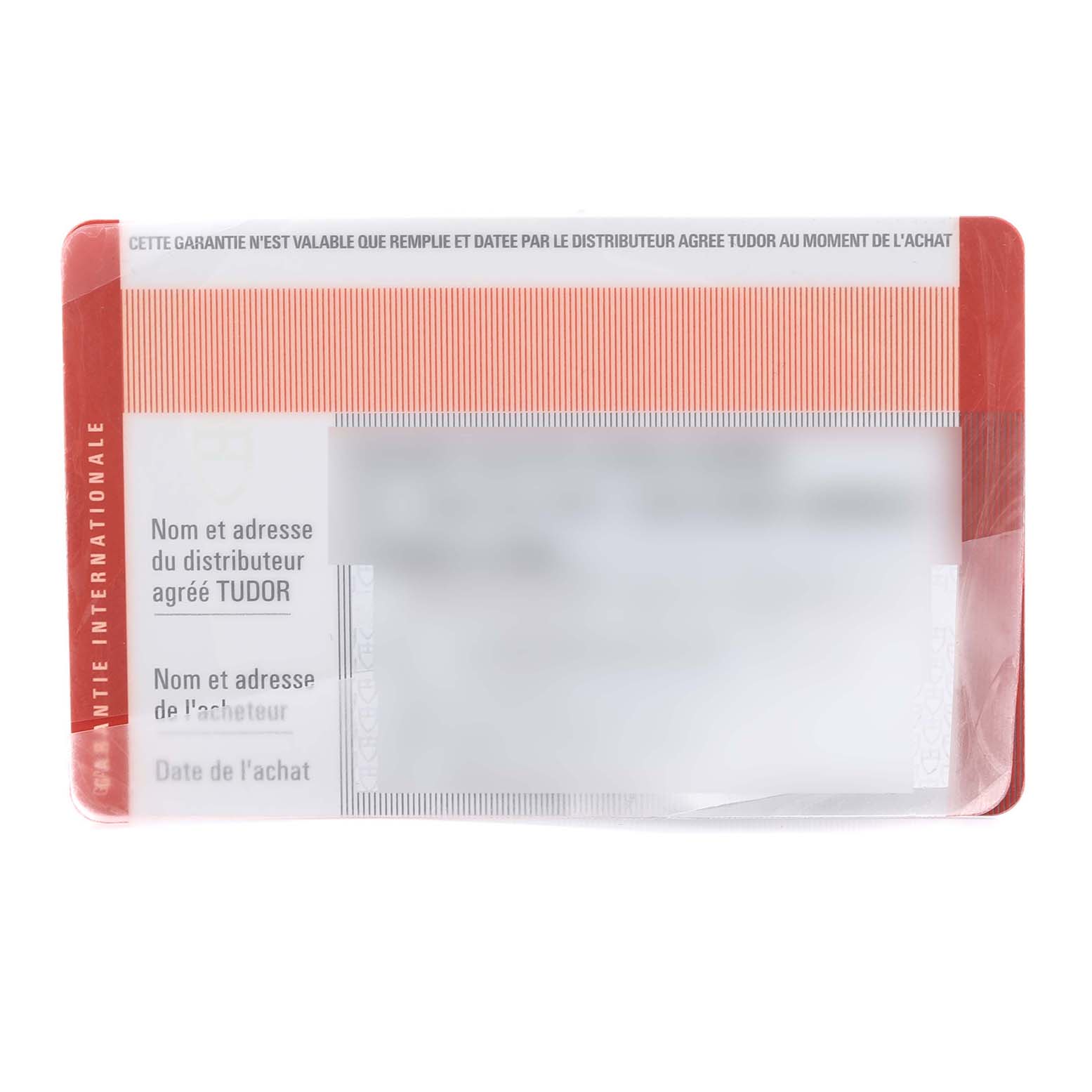 This image shows a warranty card for the Tudor Heritage Chrono 70330N Men's Stainless Steel Grey Dial 70330N Men's Stainless Steel Grey Dial watch, viewed from the front.