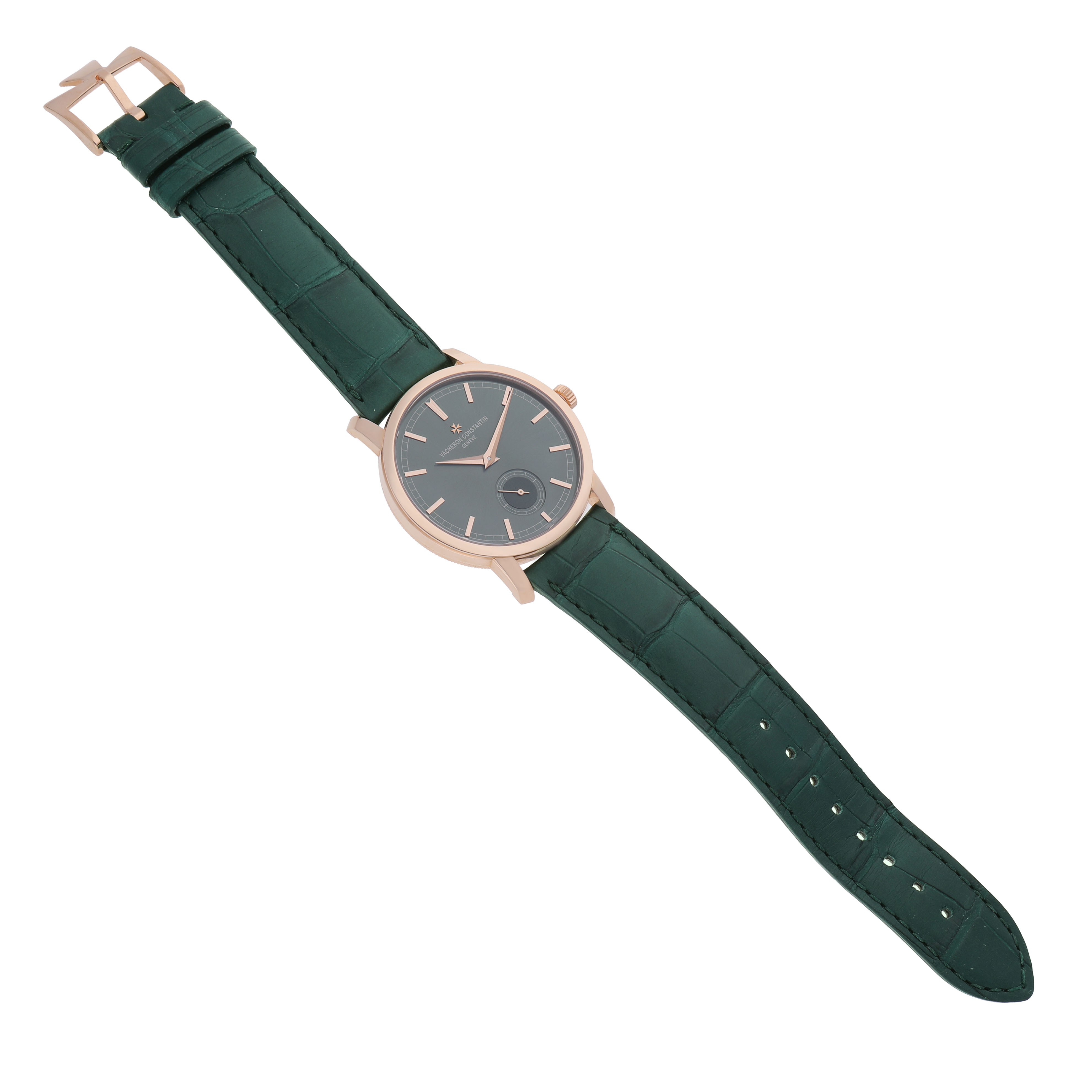 The Traditionnelle model by Vacheron Constantin is shown from above, displaying the green strap and watch face.