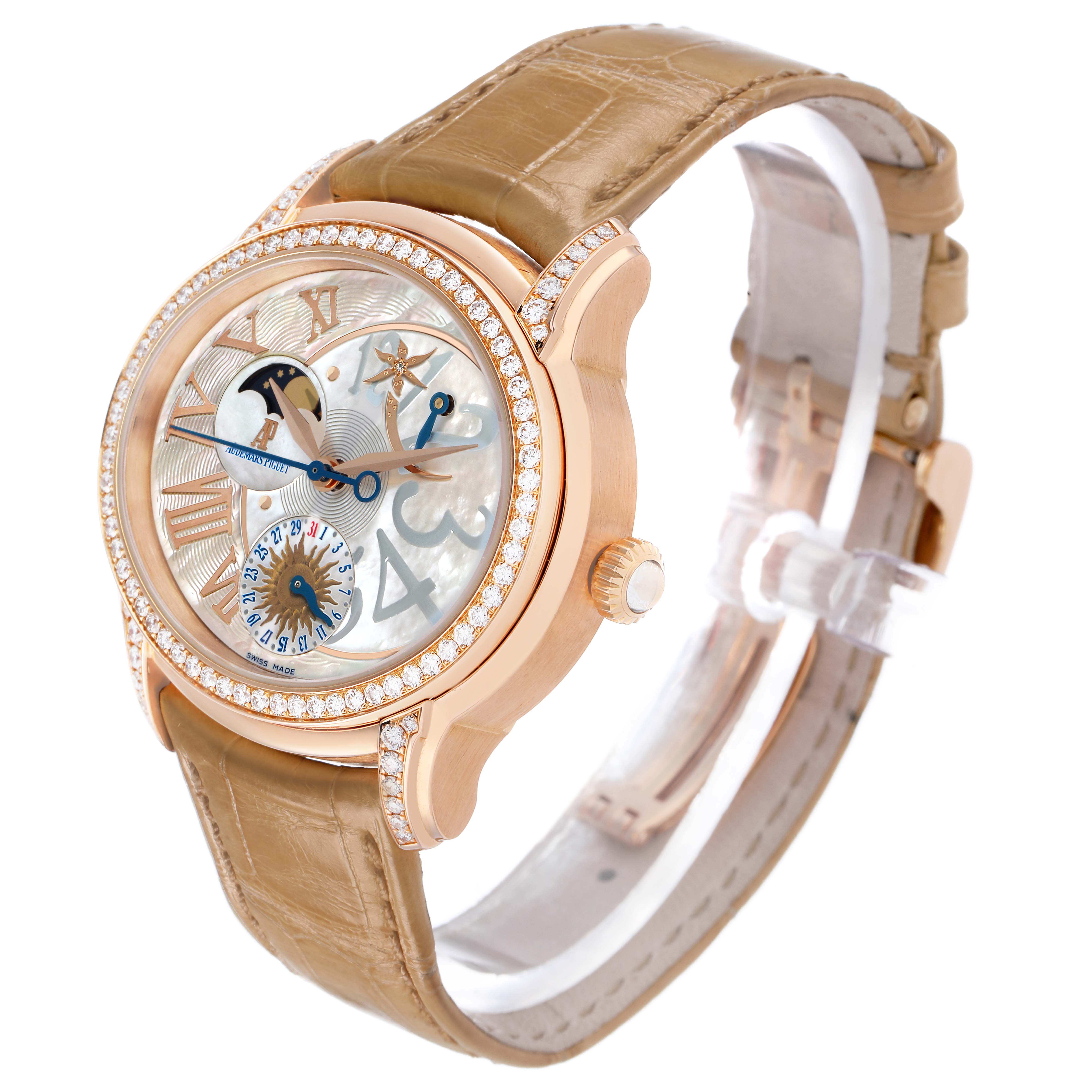 The Audemars Piguet Millenary 77315OR Women's Rose Gold Mother of Pearl Dial watch is shown at a three-quarter angle, highlighting the dial, diamond-studded bezel, and leather strap.