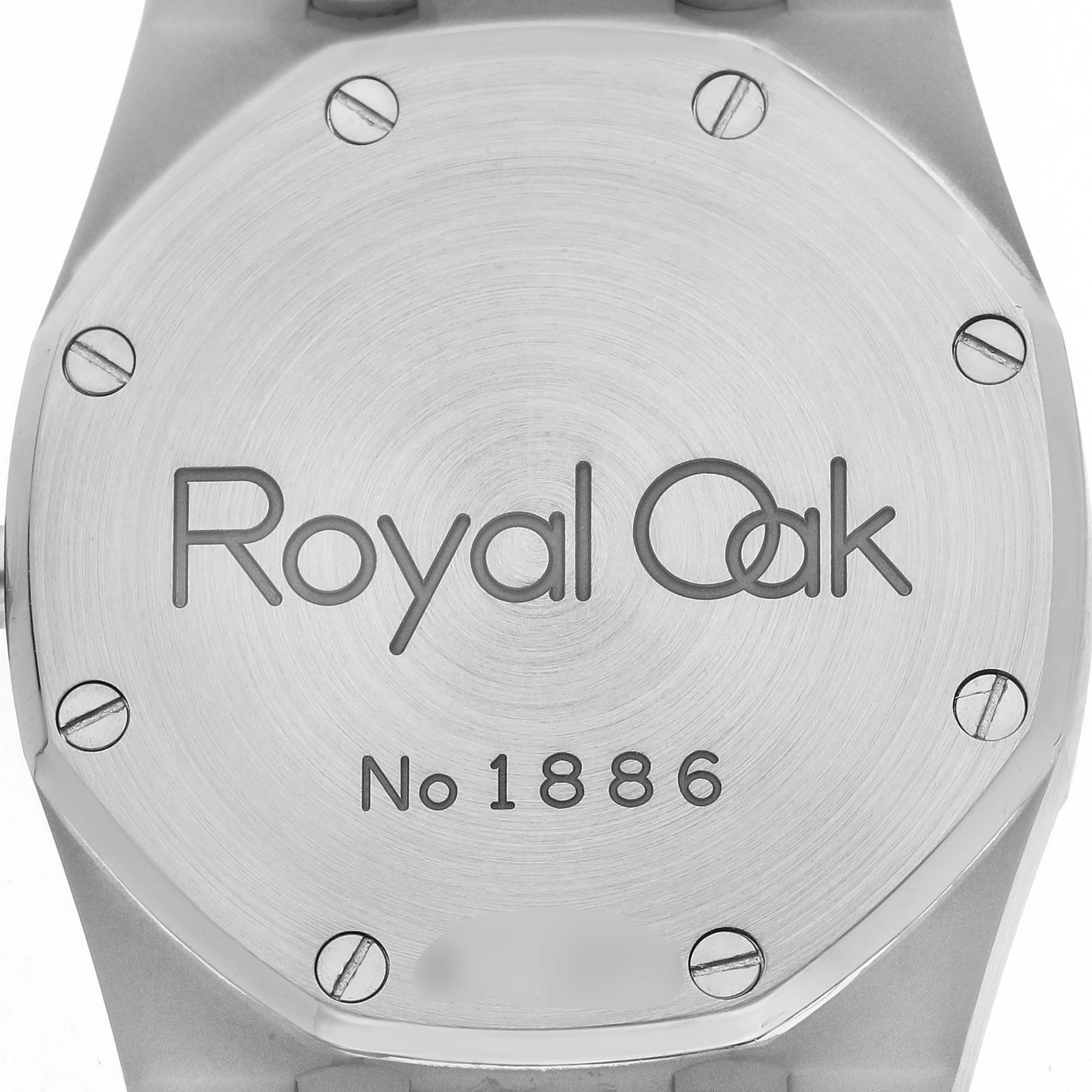 The image shows the back of an Audemars Piguet Royal Oak 15000ST.OO.0789ST.06 Men's Stainless Steel Blue Dial watch, highlighting the case back and engraved details.