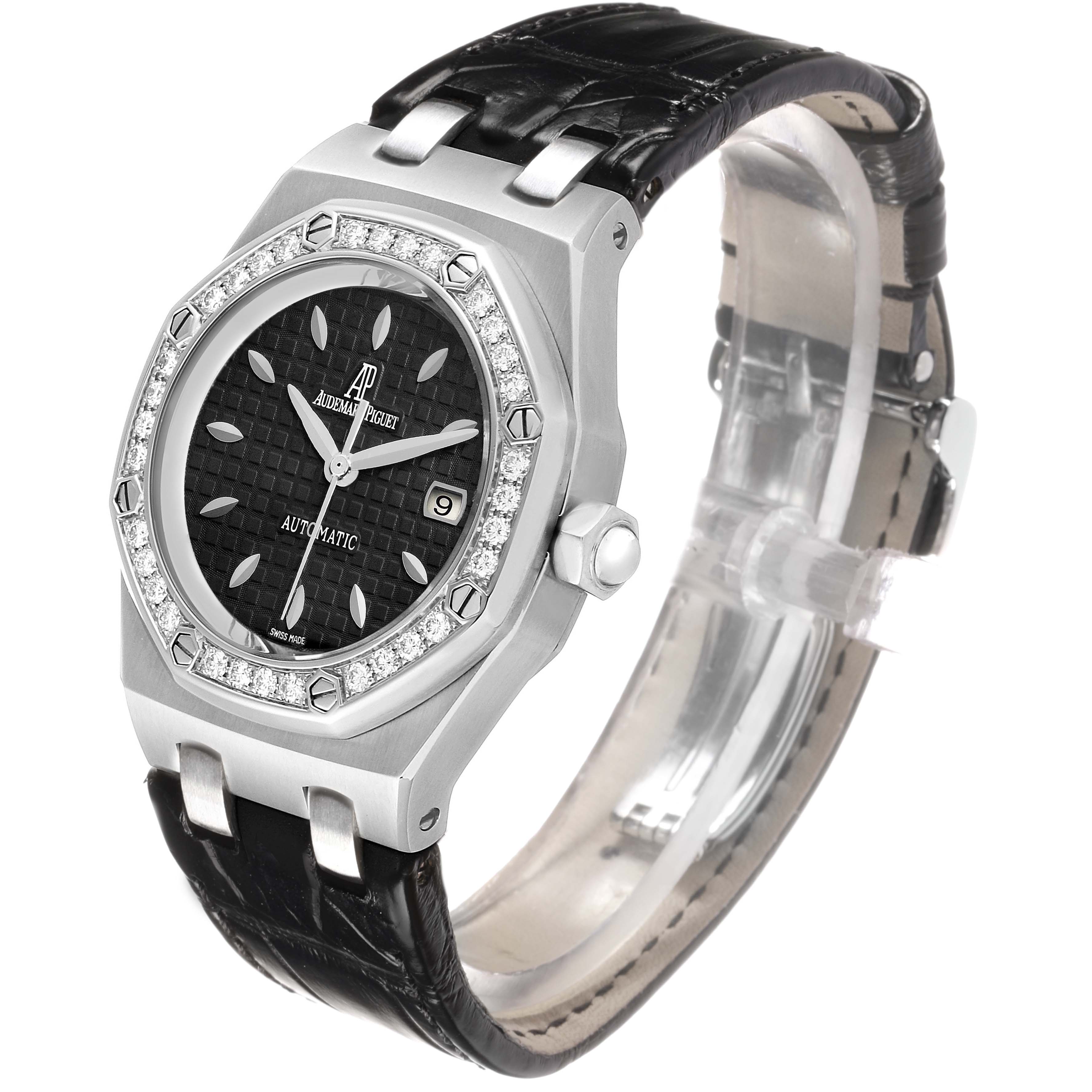 The Audemars Piguet Royal Oak 77321ST Women's Stainless Steel Black Dial watch is shown at a three-quarter angle highlighting the dial, bezel, crown, and part of the leather strap.