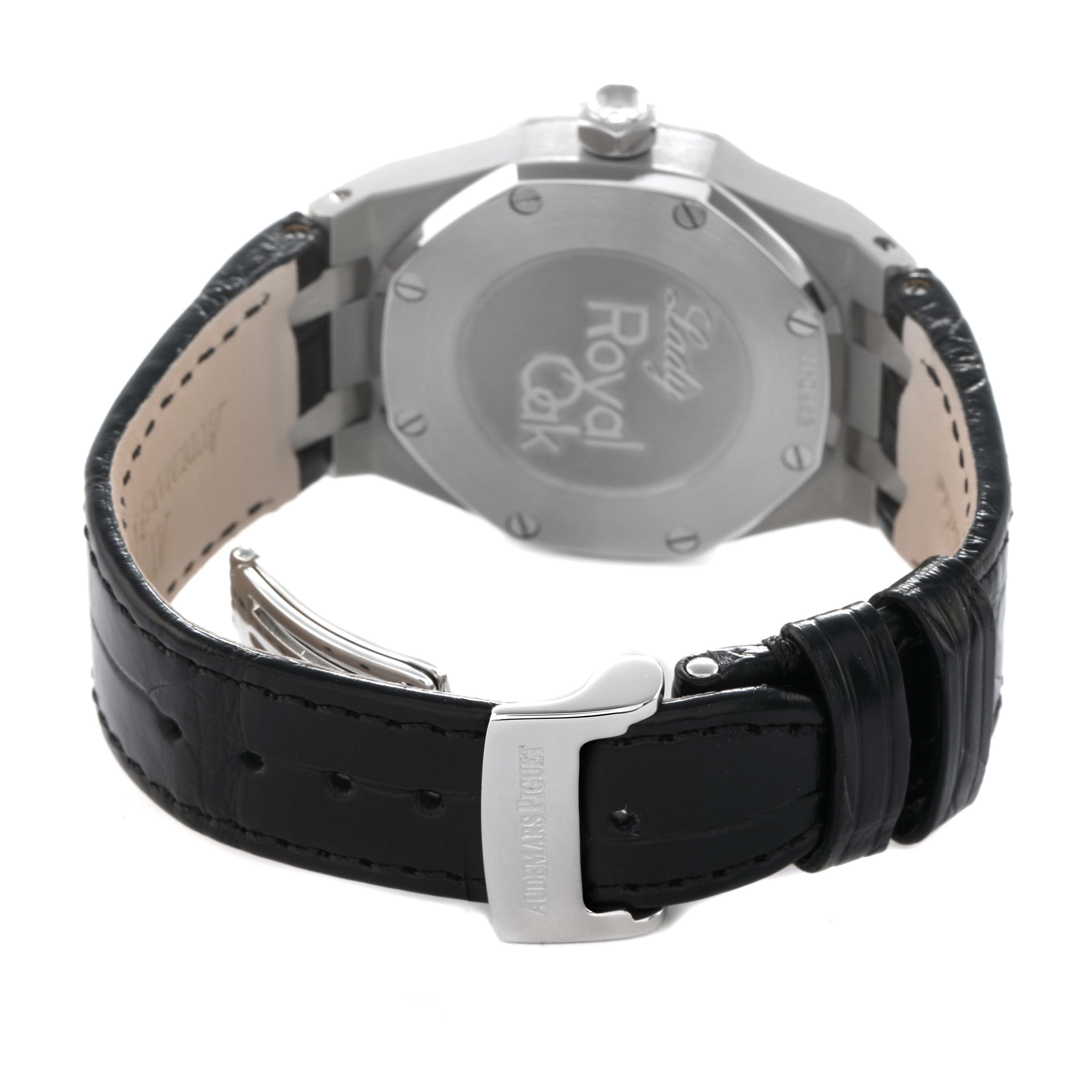 The image shows the back of the Audemars Piguet Royal Oak 77321ST Women's Stainless Steel Black Dial watch, highlighting the case back and leather strap with clasp.
