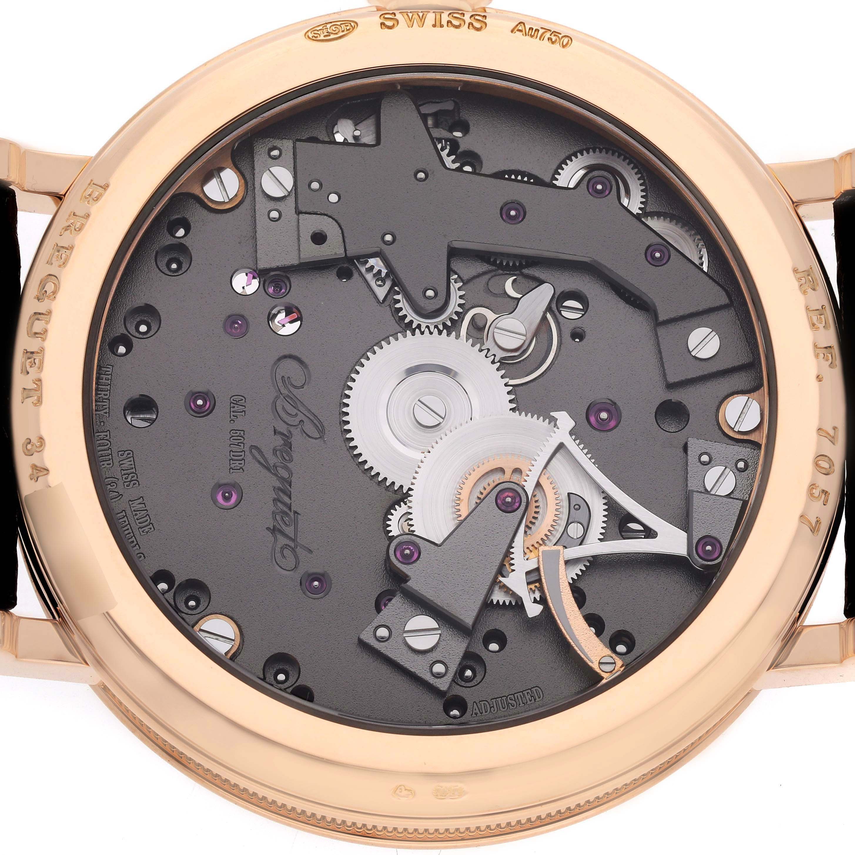 The image shows the back angle of the Breguet Tradition 7057BR/G9/9W6 Men's Rose Gold Silver Dial model, revealing intricate gears and mechanisms.