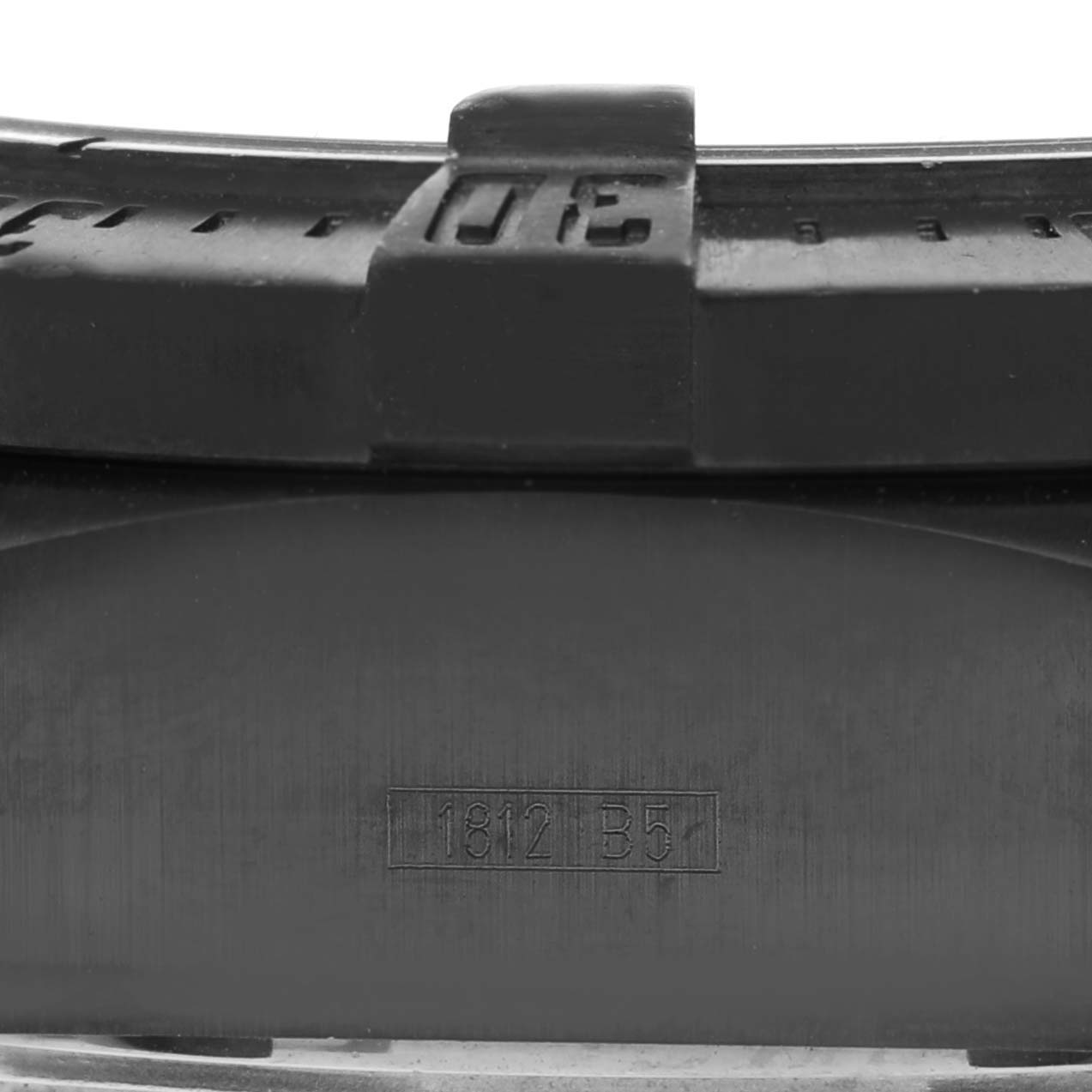 The image shows a close-up view of the bezel and part of the case back of a Breitling Avenger M17330 Men's Stainless Steel Black Dial M17330 Men's Stainless Steel Black Dial watch.