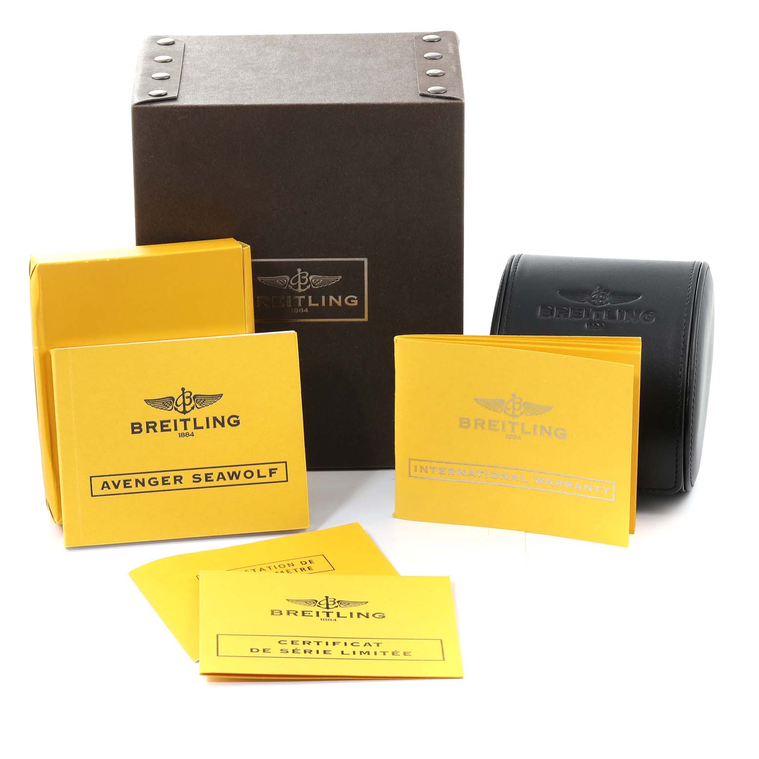 The image shows the packaging and documents of the Breitling Avenger M17330 Men's Stainless Steel Black Dial M17330 Men's Stainless Steel Black Dial model, including the box, leather case, and booklets.