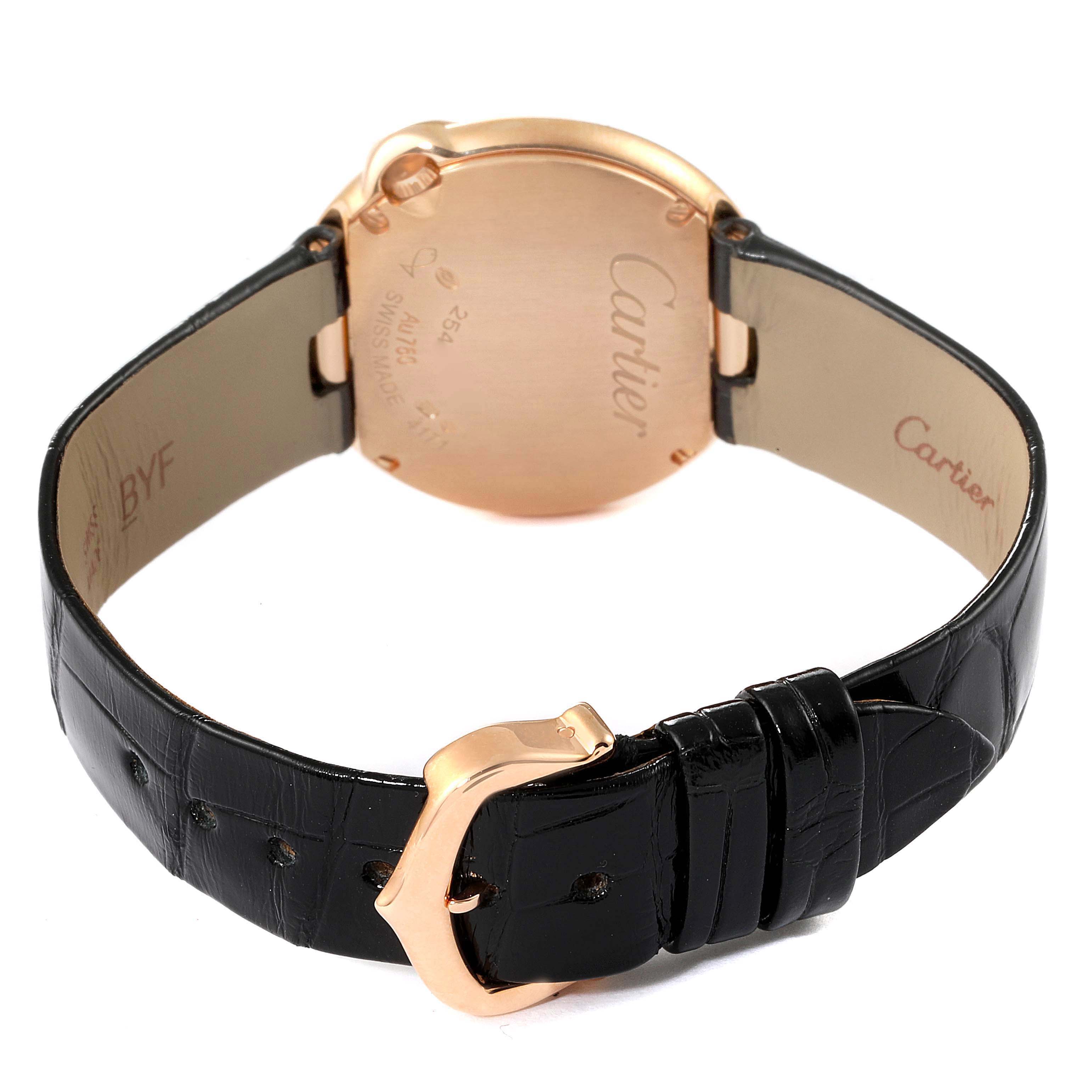 This image shows the back case and strap of a Cartier Ballon Bleu watch at an angle, featuring the leather strap and buckle.