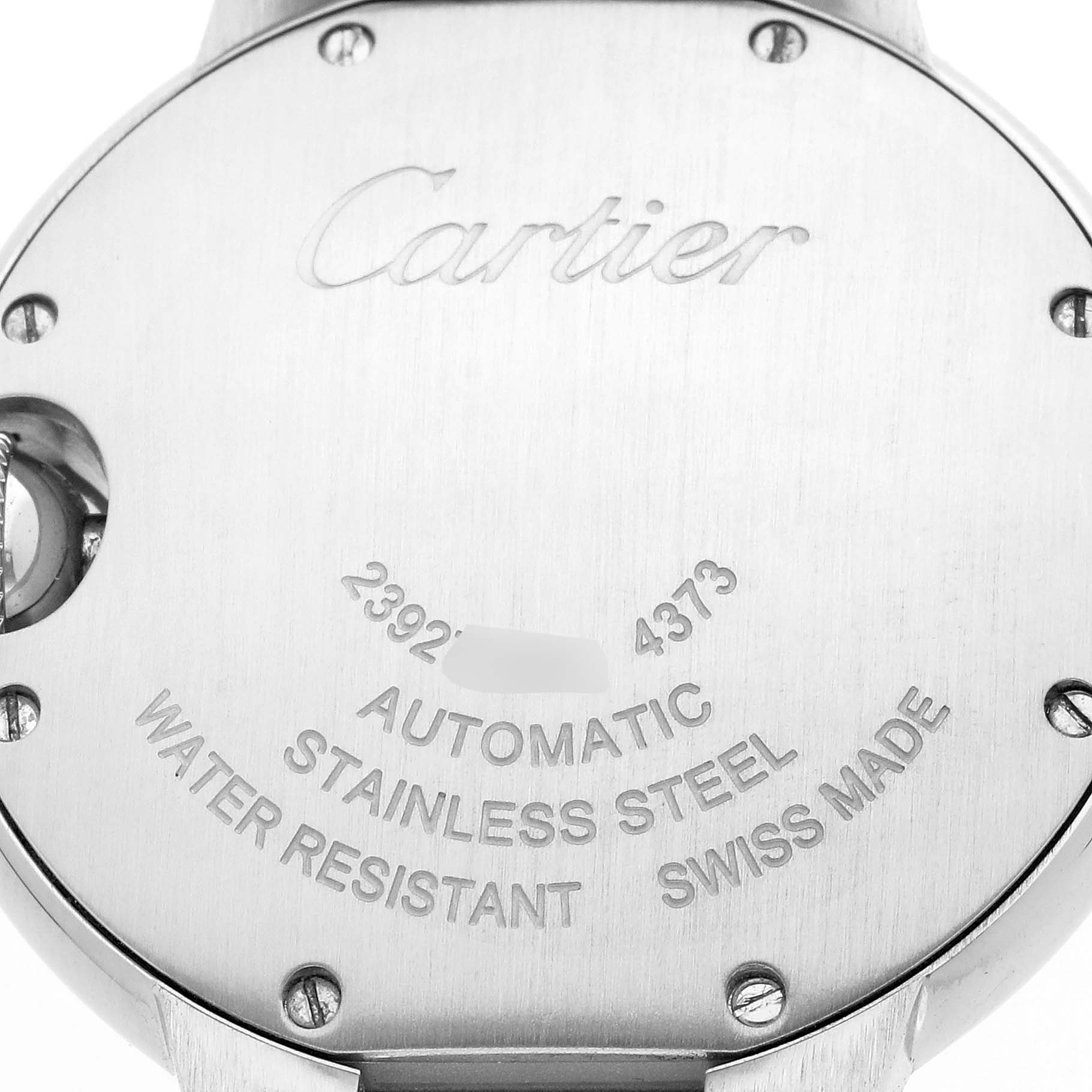 The image shows the back case of a Ballon Bleu by Cartier with branding and specifications etched on it.