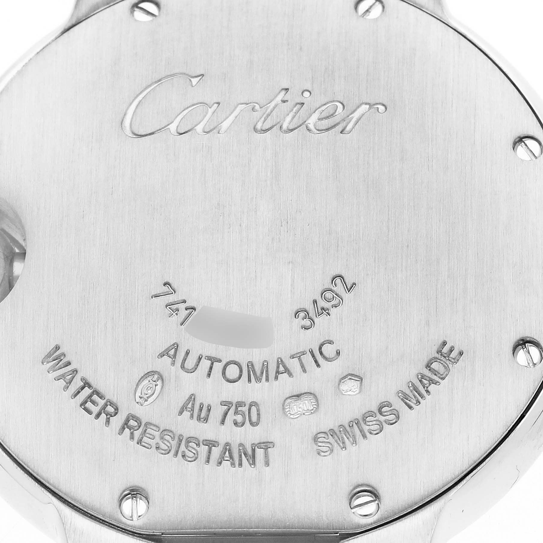 The image shows the back case of the Cartier Ballon Bleu WE902047 Women's White Gold Silver Dial WE902047 Women's White Gold Silver Dial watch, showcasing engraved details and serial markings.