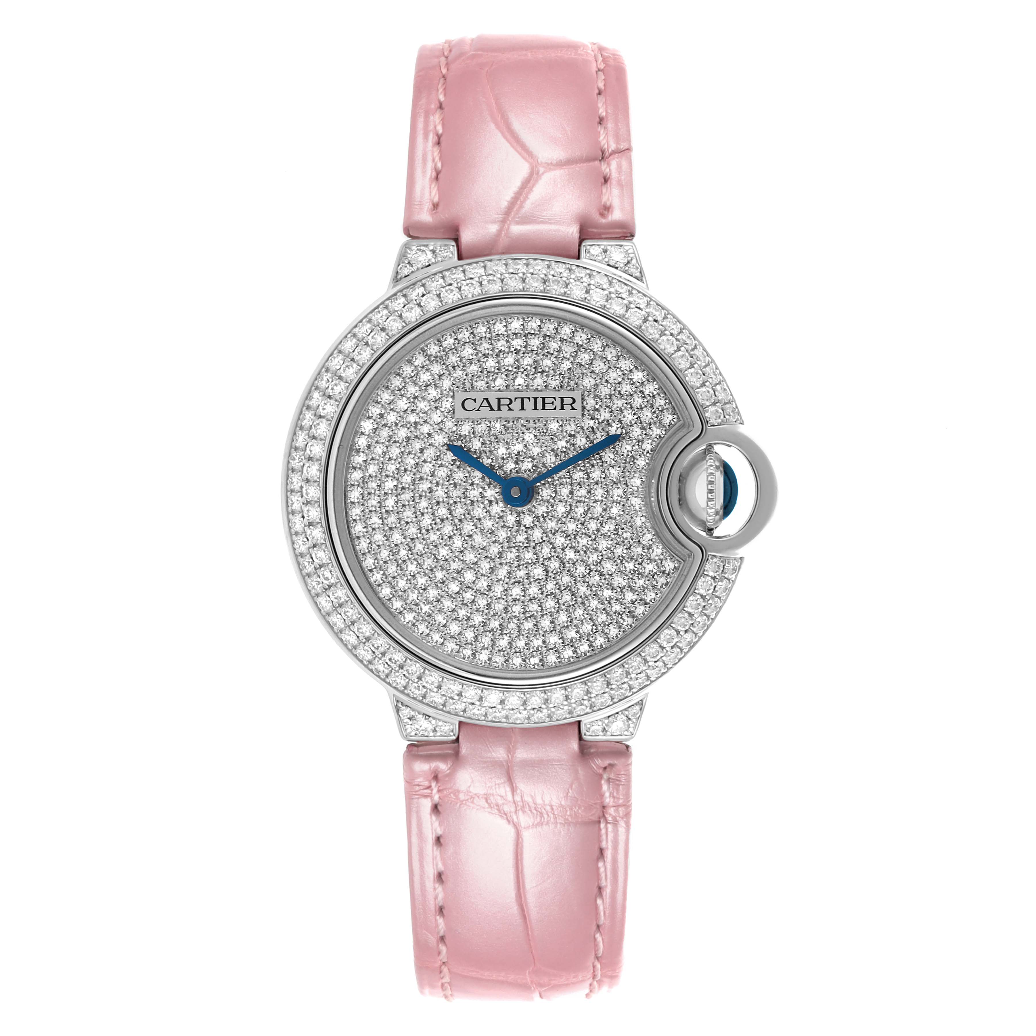 The Cartier Ballon Bleu WE902047 Women's White Gold Silver Dial WE902047 Women's White Gold Silver Dial watch is shown from the front, featuring a diamond-studded face and a pink leather strap.