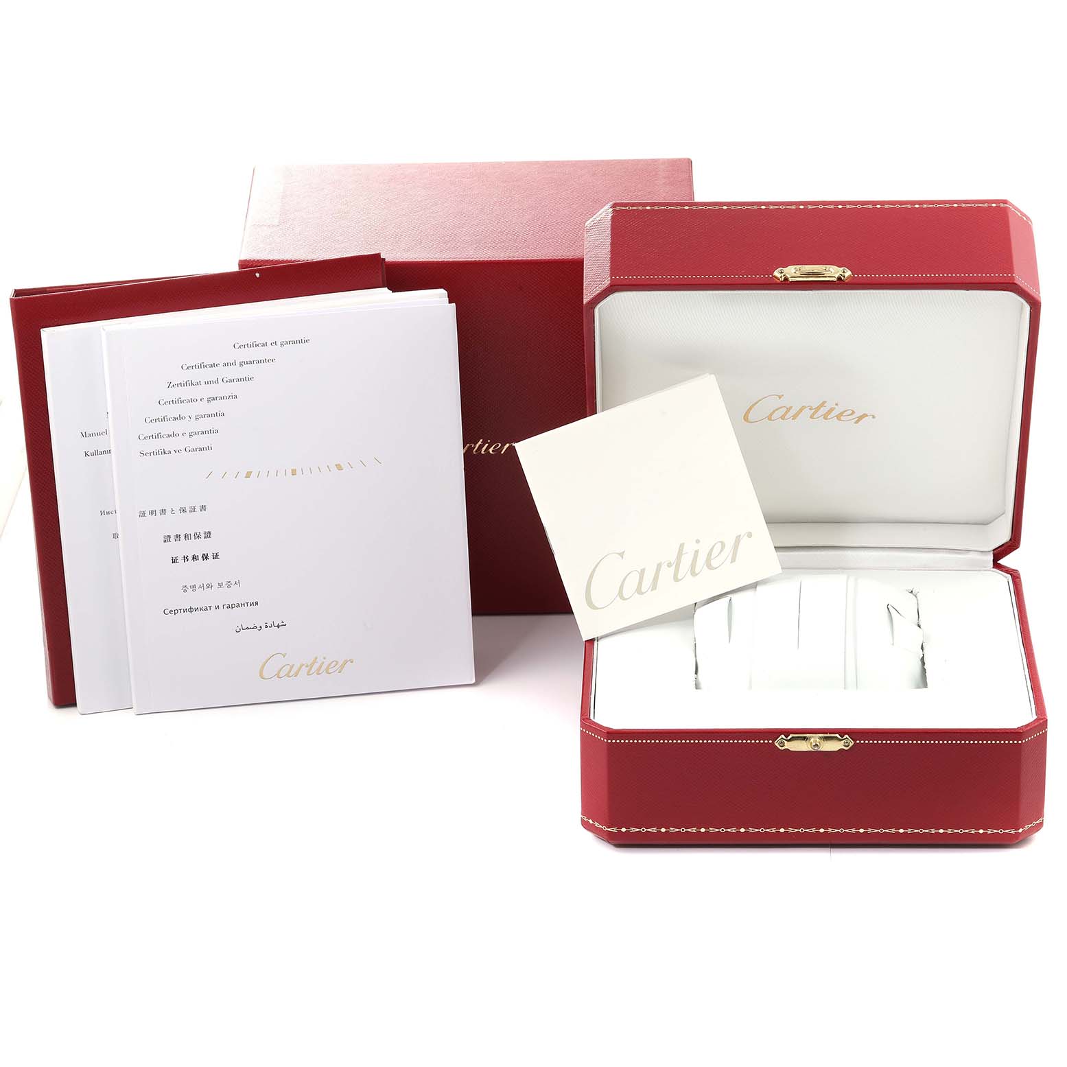The image shows the packaging and accessories for a Calibre de Cartier watch by Cartier, including the box and documentation.