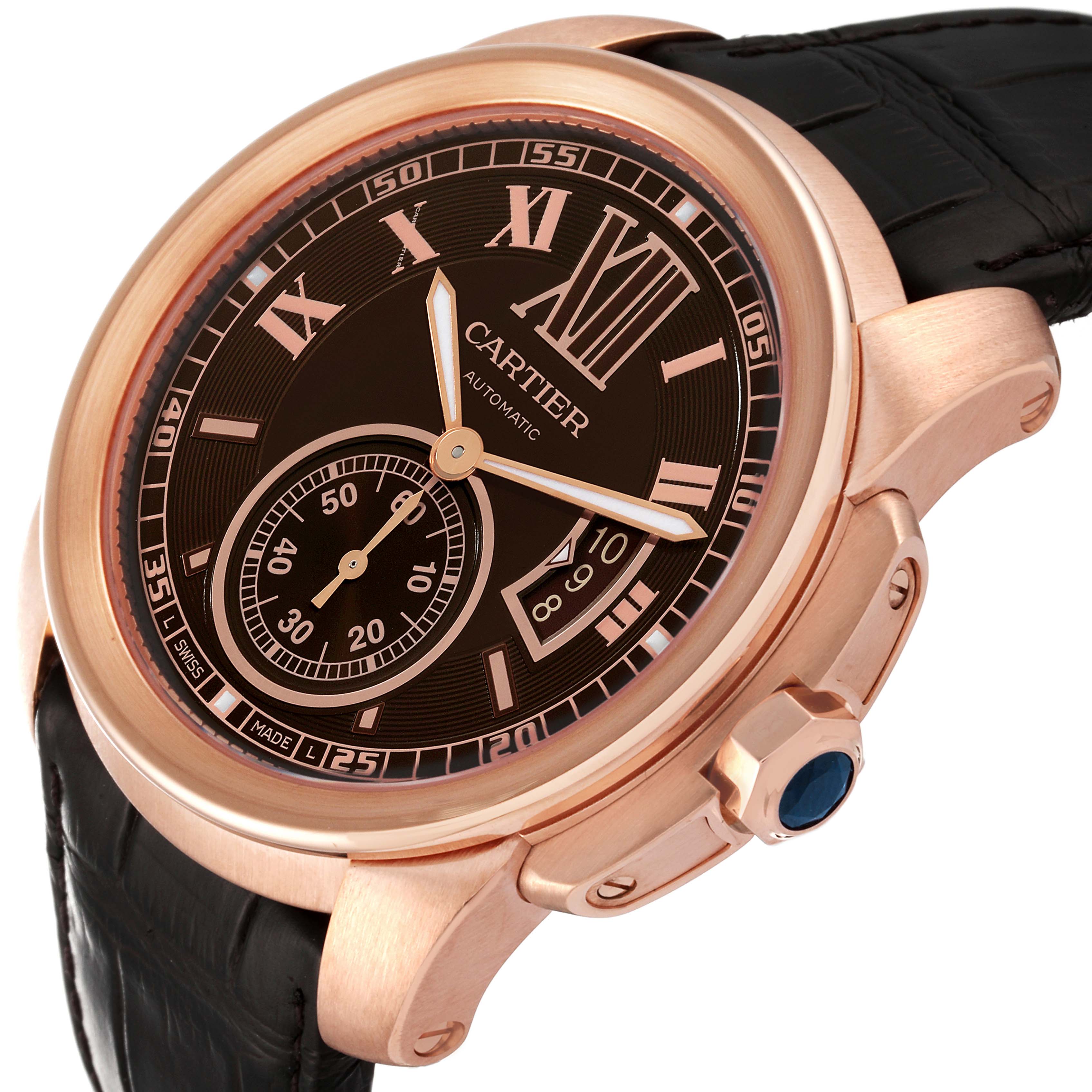 The image shows a rose gold Calibre de Cartier watch by Cartier at an angled view, highlighting the face, bezel, and crown.