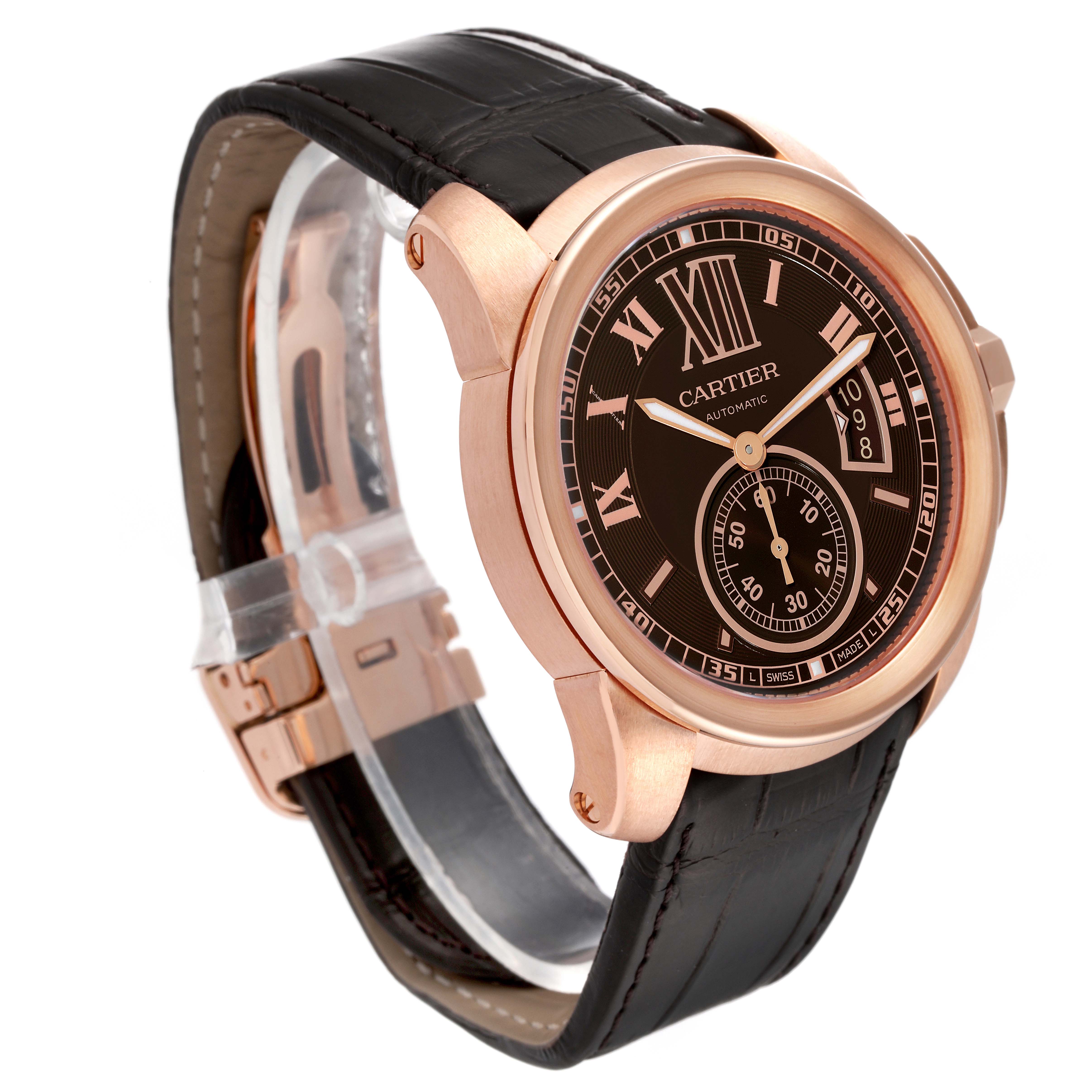 The image shows a Calibre de Cartier watch by Cartier at a front-side angle, highlighting its dial, case, and black leather strap.