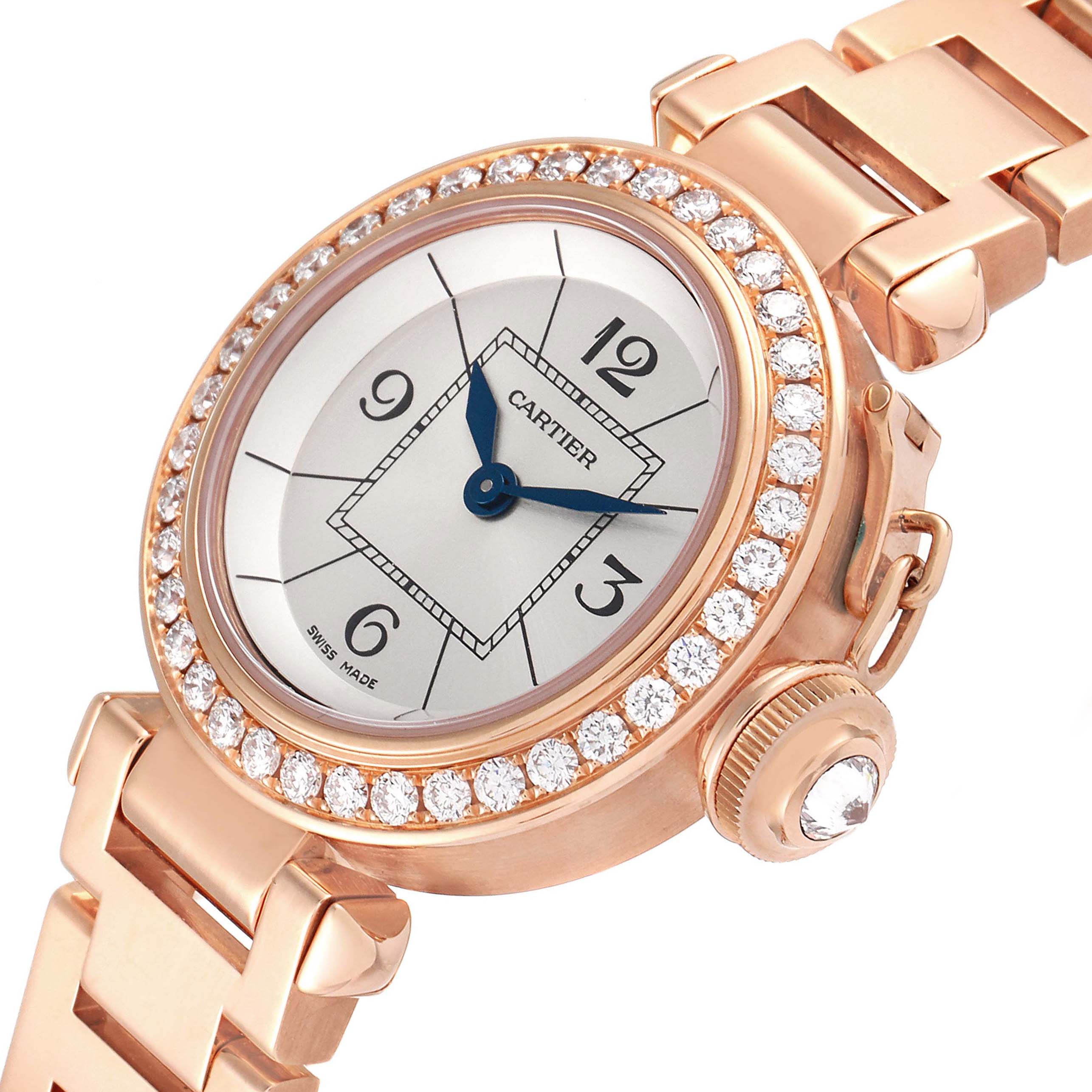 The angle shows a close-up of the Cartier Pasha WJ124014 Women
s Rose Gold Silver Dial WJ124014 Women
s Rose Gold Silver Dial watch face, bezel with diamonds, crown, and part of the bracelet.