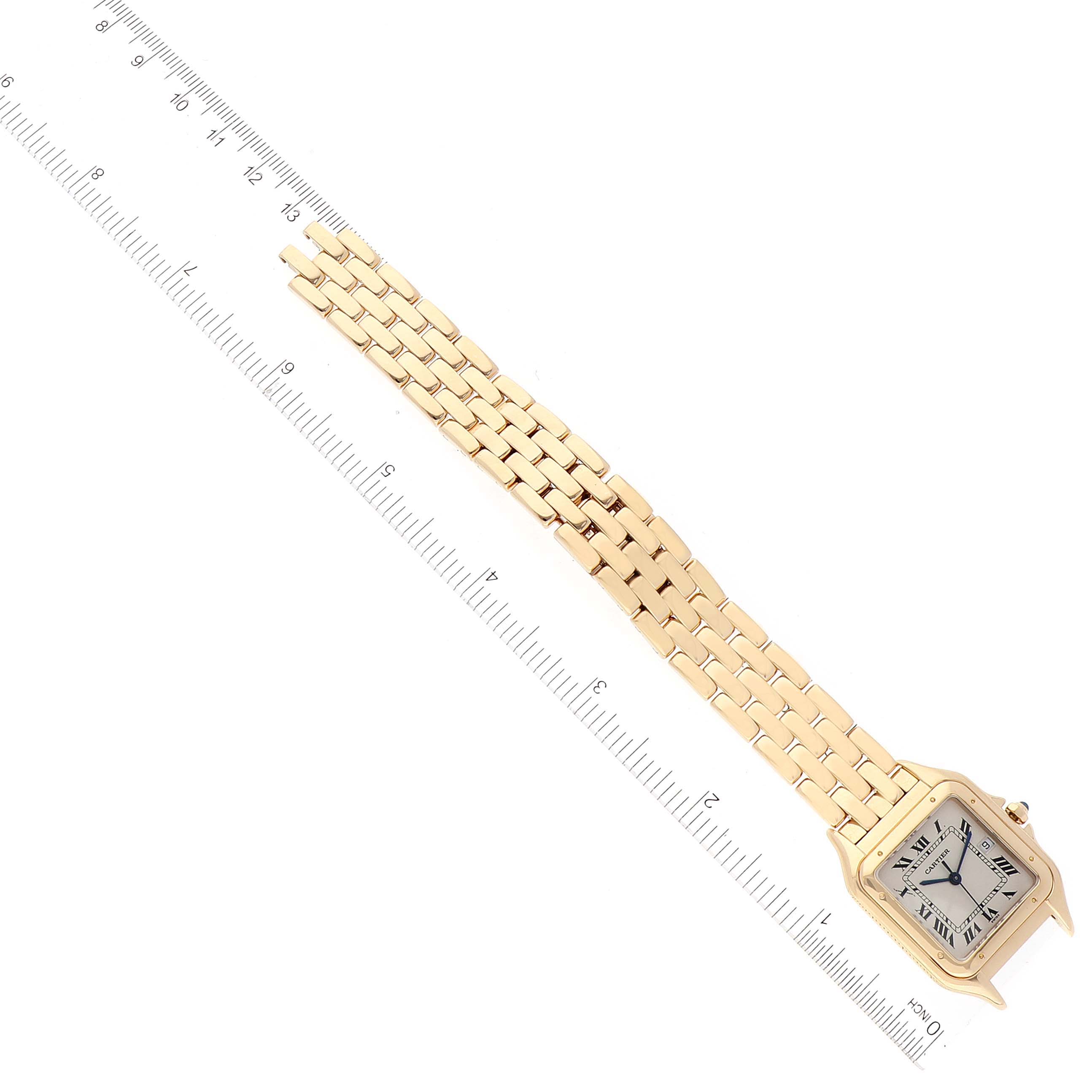 This image shows a Cartier Panthere W25014B9 Men's Yellow Gold Silver Dial W25014B9 Men's Yellow Gold Silver Dial model watch laid flat with its bracelet and face visible, next to a ruler for scale.