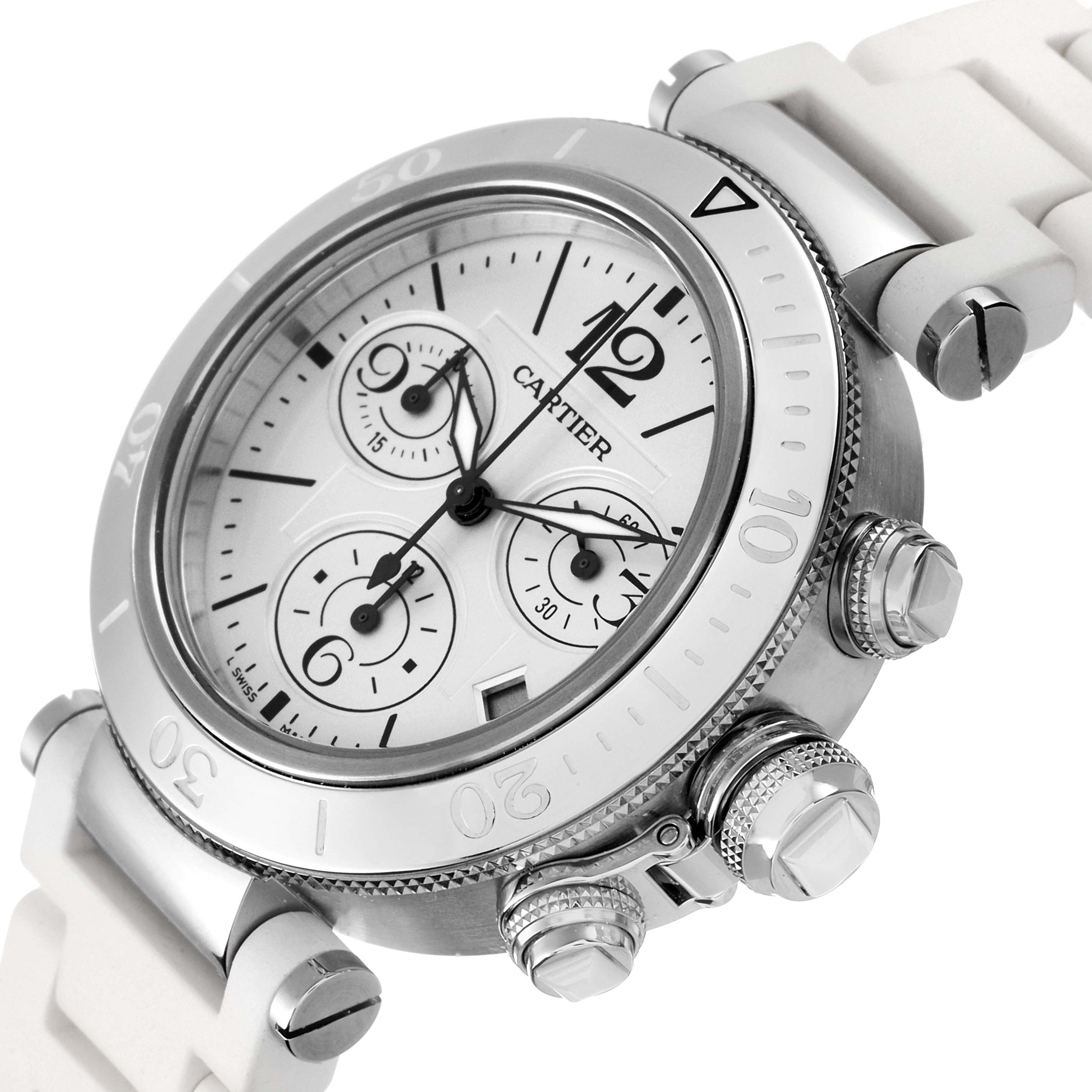 The image shows a side angle of the Cartier Pasha W3140005 Women's Stainless Steel White Dial W3140005 Women's Stainless Steel White Dial watch, highlighting the face, bezel, chronograph buttons, and white strap.