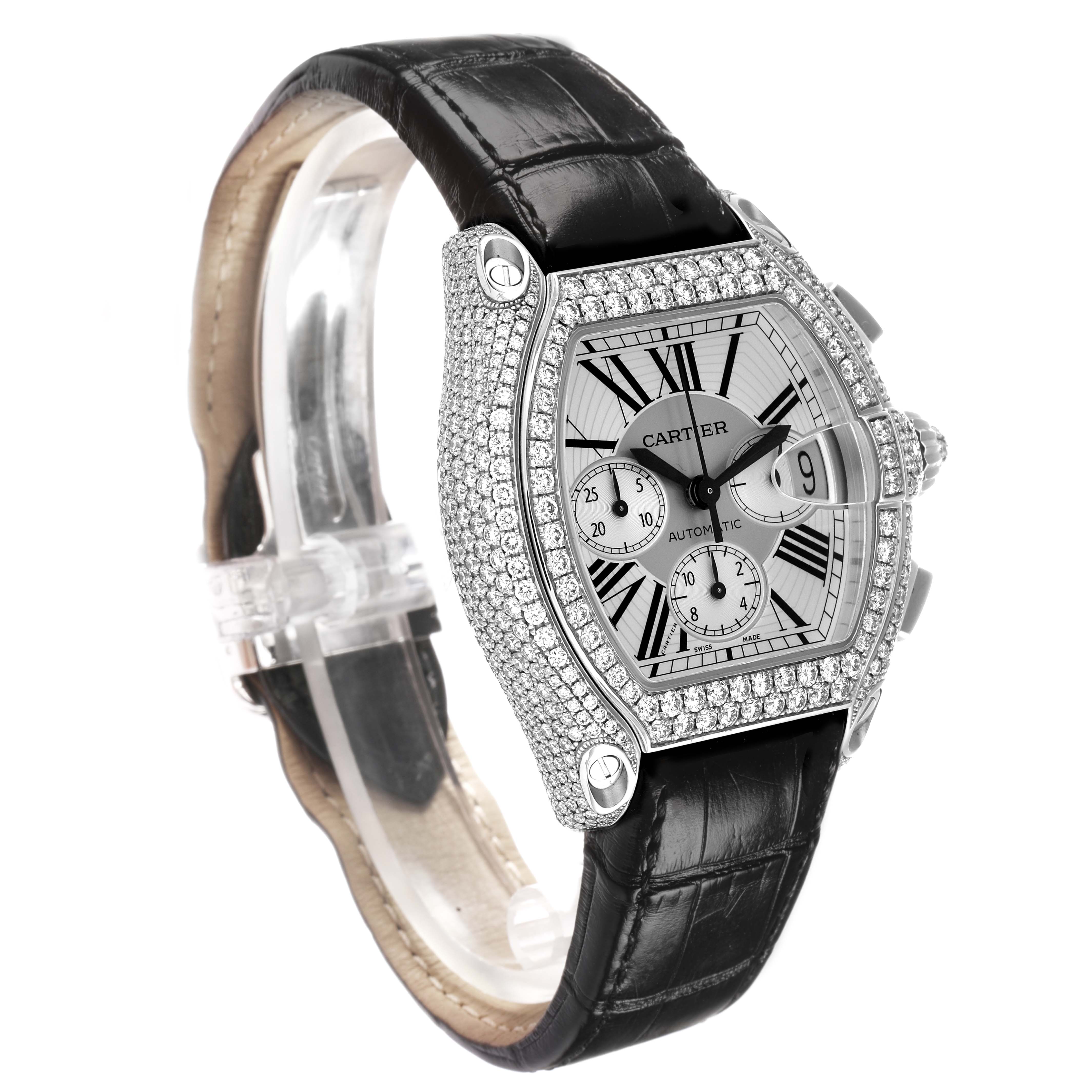 The Cartier Roadster WE50032H Men
s White Gold Silver Dial watch is shown at a three-quarter angle, highlighting the gem-encrusted case, dial, and leather strap.