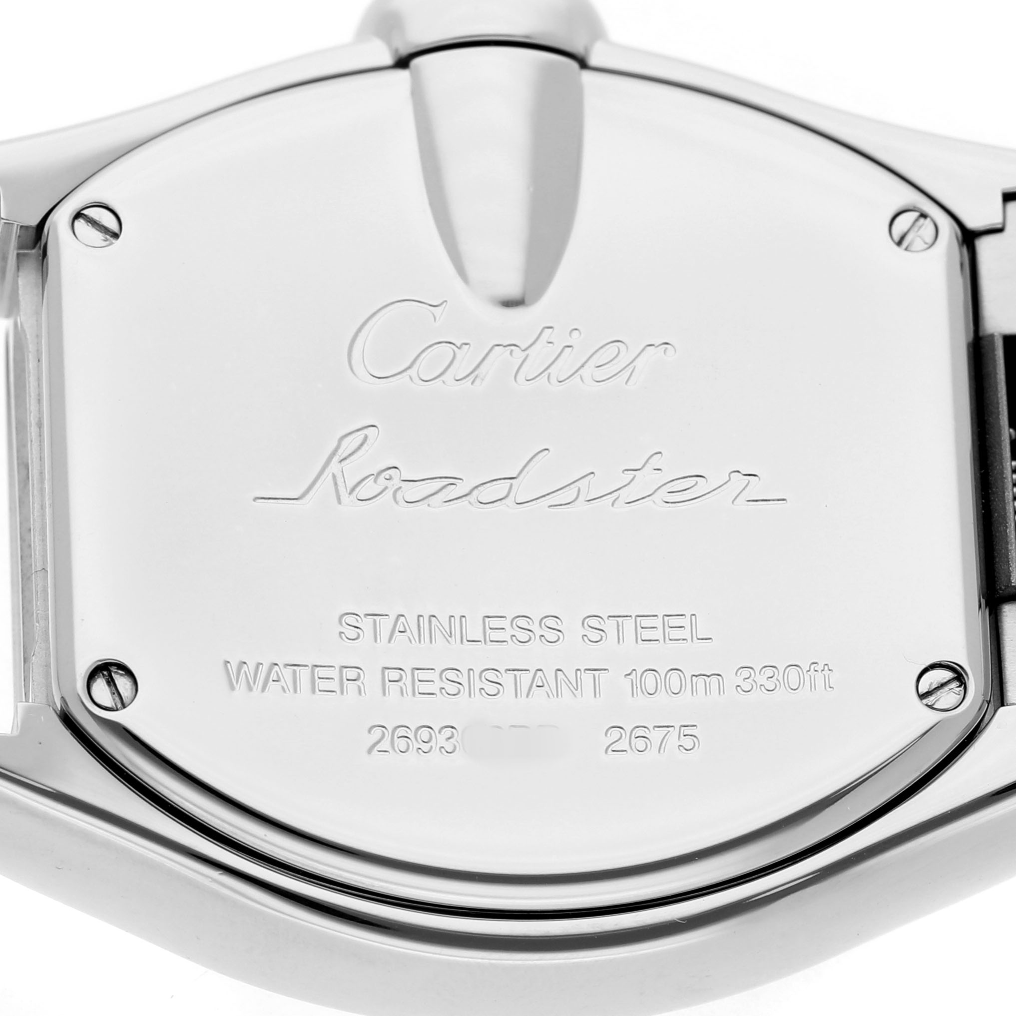 The image shows the back case of the Cartier Roadster W62016V3 Women's Stainless Steel Silver Dial watch, displaying engravings and screws.