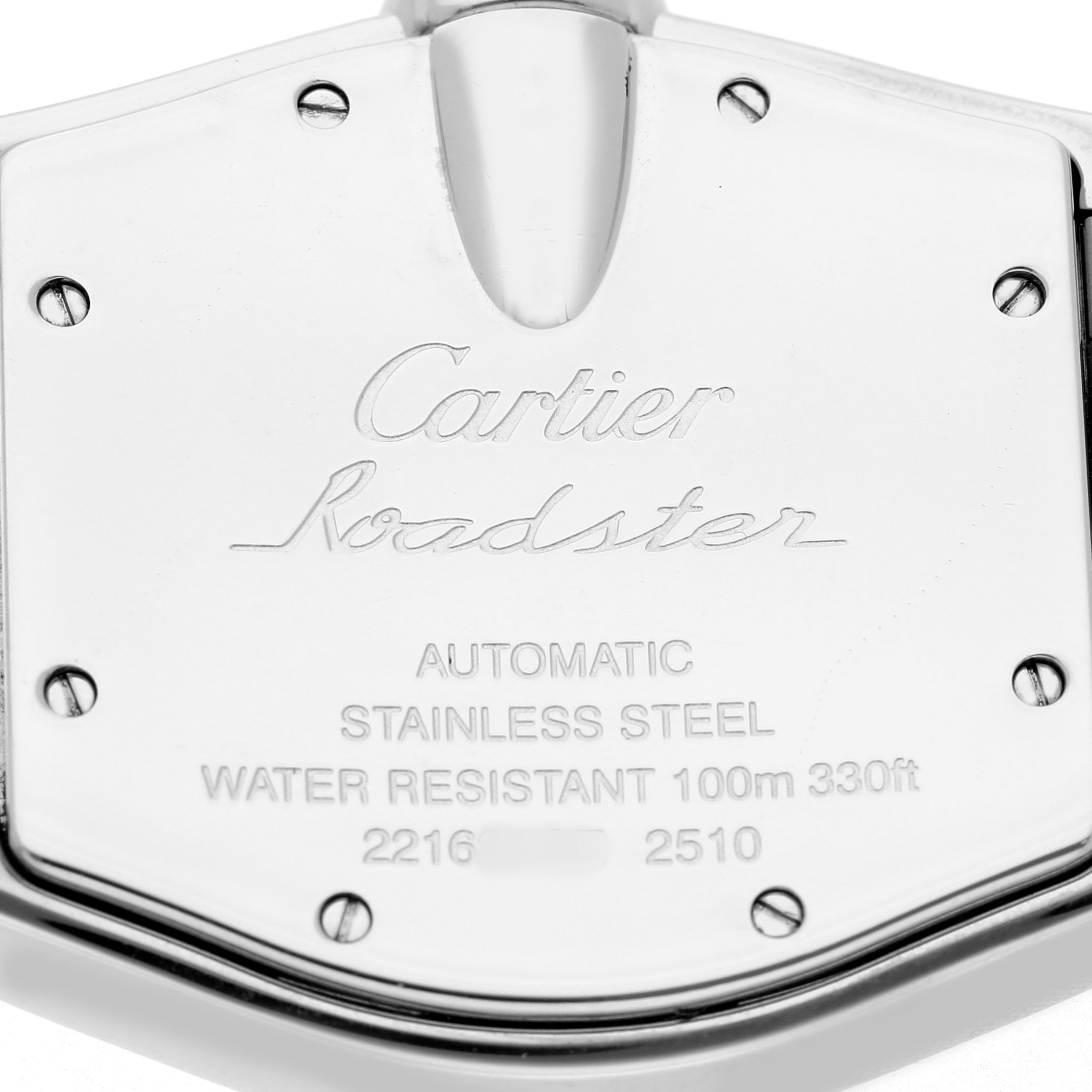 The image shows the back case of the Cartier Roadster W62002V3 Men's Stainless Steel Black Dial watch, displaying branding and specifications.