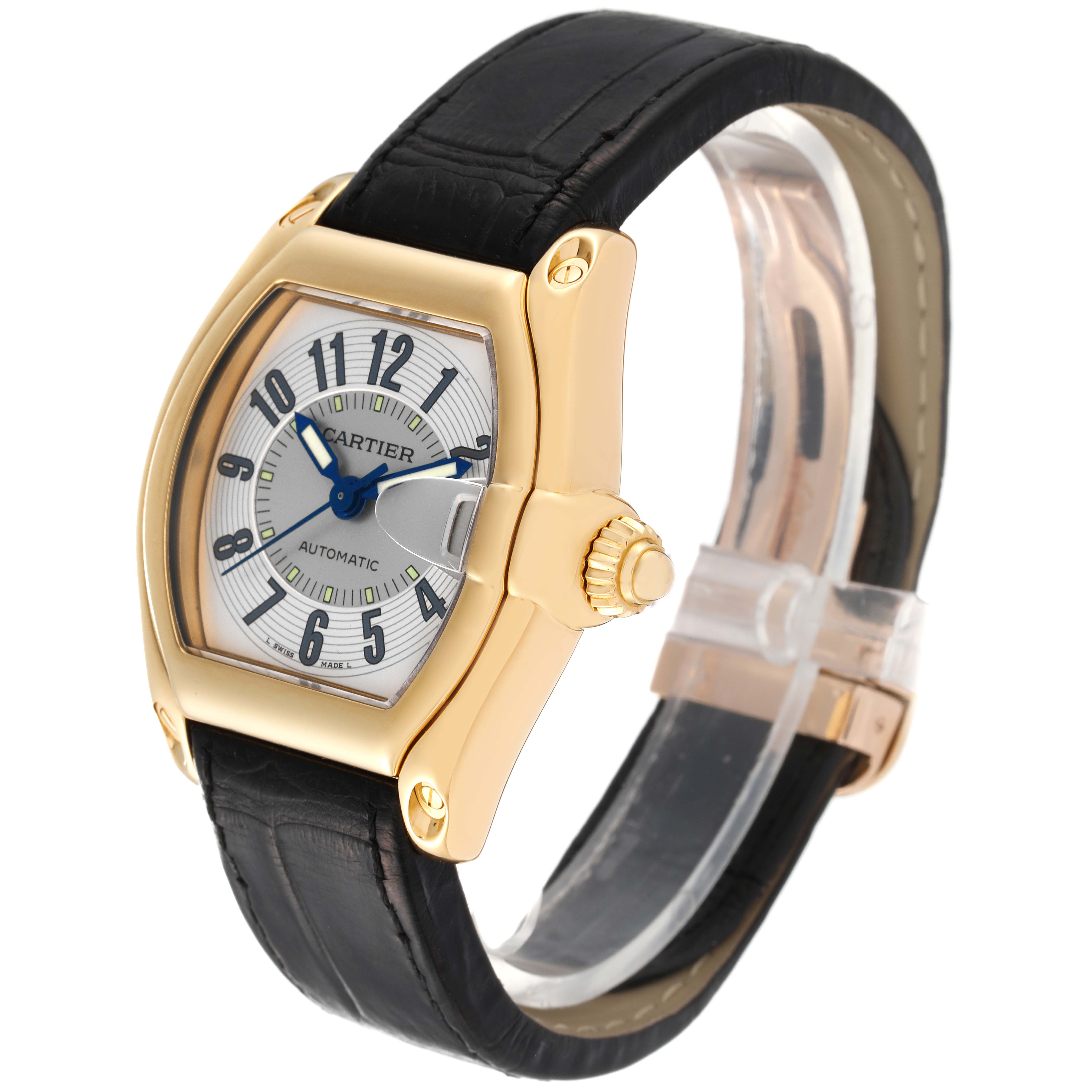 The Cartier Roadster W62005V2 Men's Yellow Gold Silver Dial W62005V2 Men's Yellow Gold Silver Dial watch is shown at an angled side view, displaying its dial, case, crown, and leather strap.