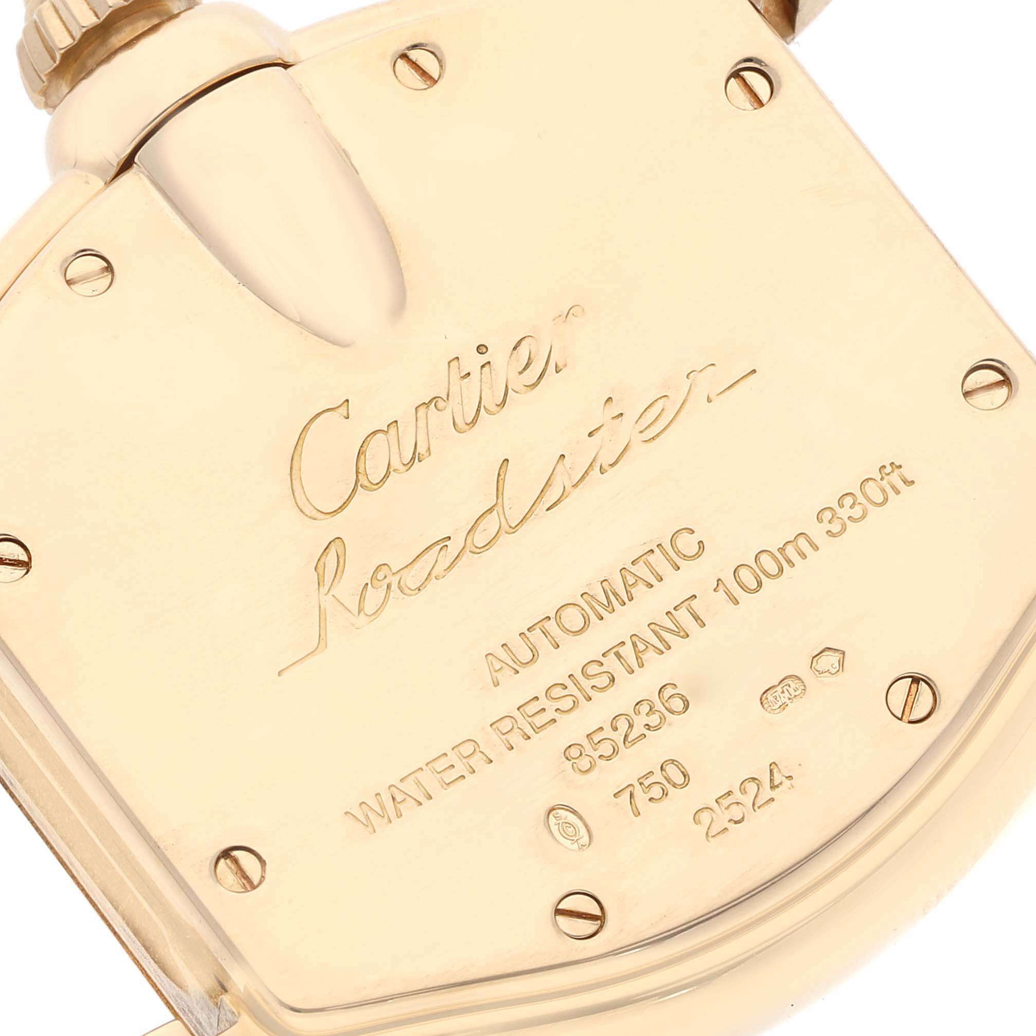 This image shows the backside of a Cartier Roadster W62005V2 Men's Yellow Gold Silver Dial W62005V2 Men's Yellow Gold Silver Dial watch, highlighting the engravings and water resistance information.