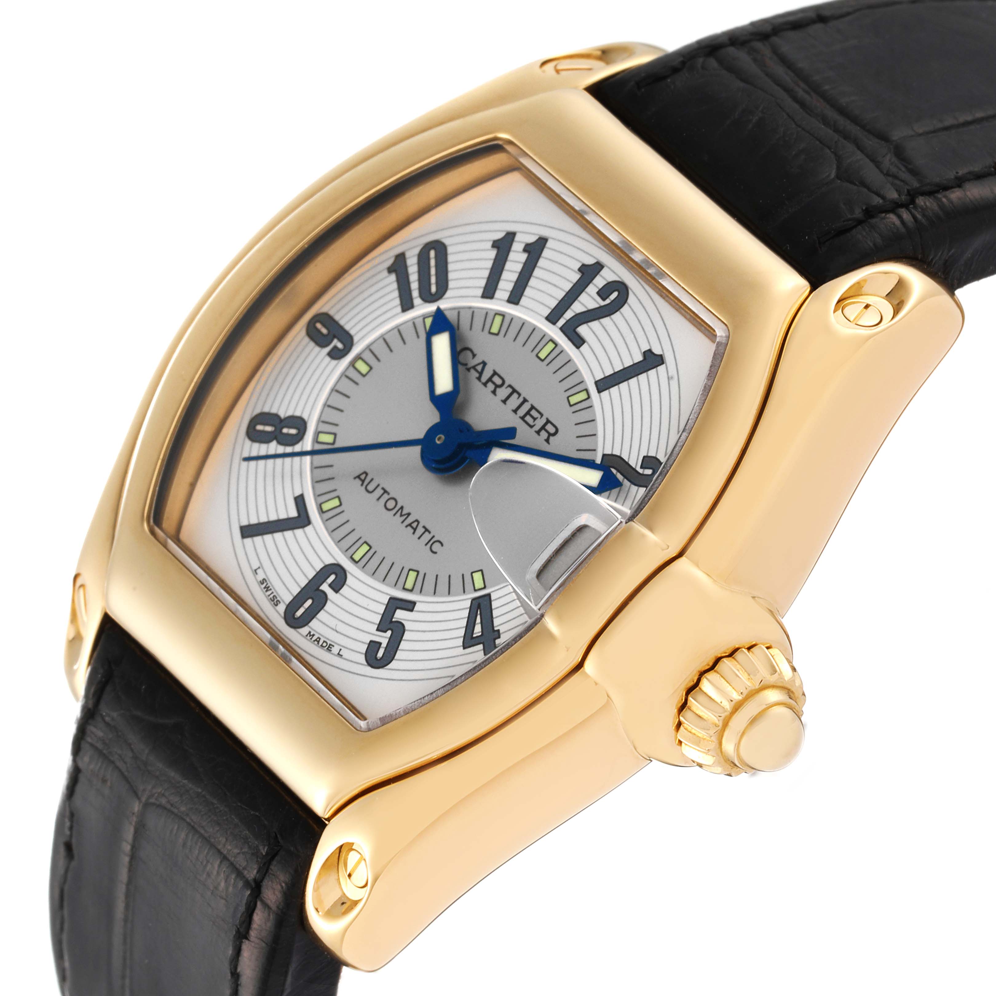 This image shows a close-up angle of the Cartier Roadster W62005V2 Men's Yellow Gold Silver Dial W62005V2 Men's Yellow Gold Silver Dial watch's face, bezel, and part of the strap.
