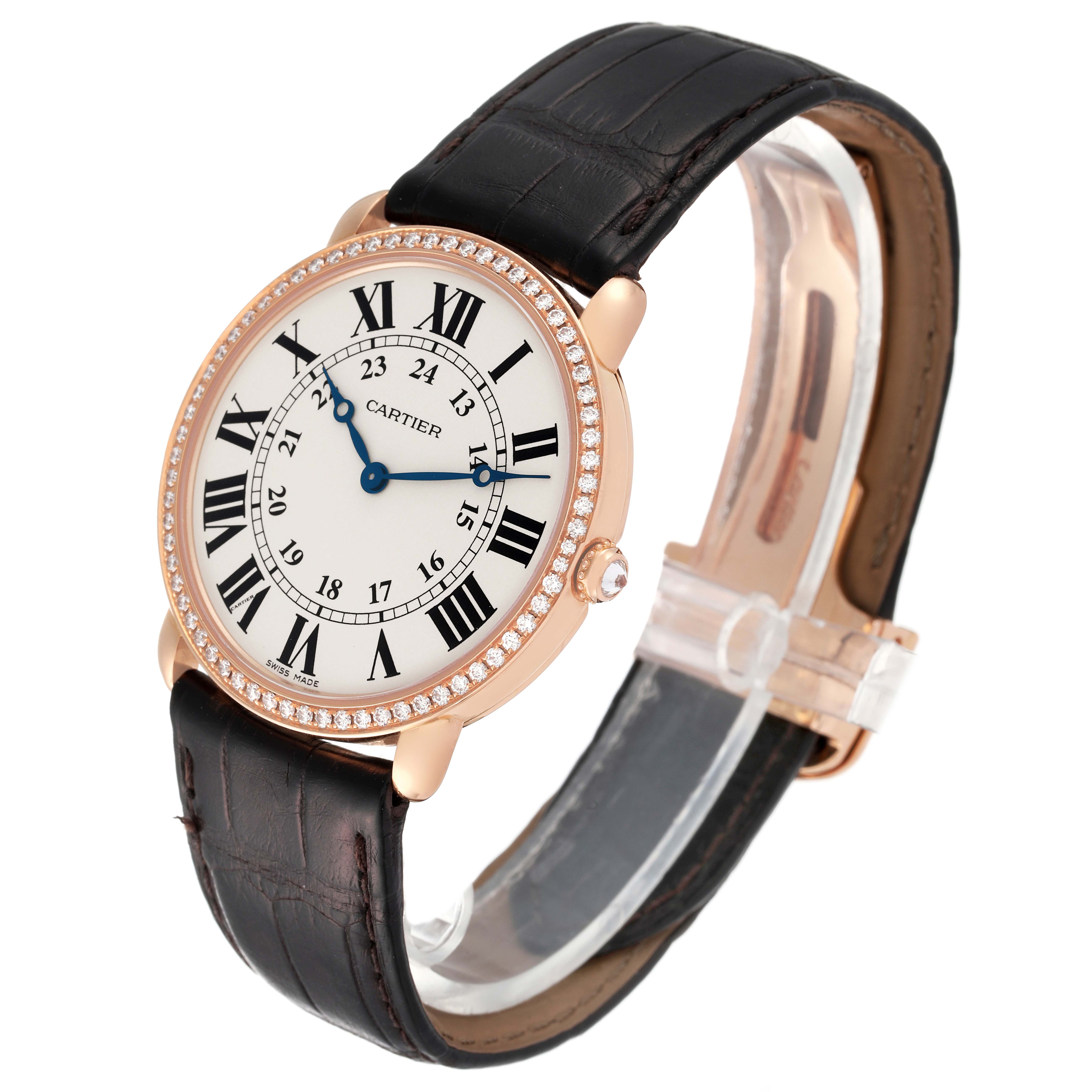 The Ronde model by Cartier is shown at an angled view, displaying its face, bezel, and leather strap.