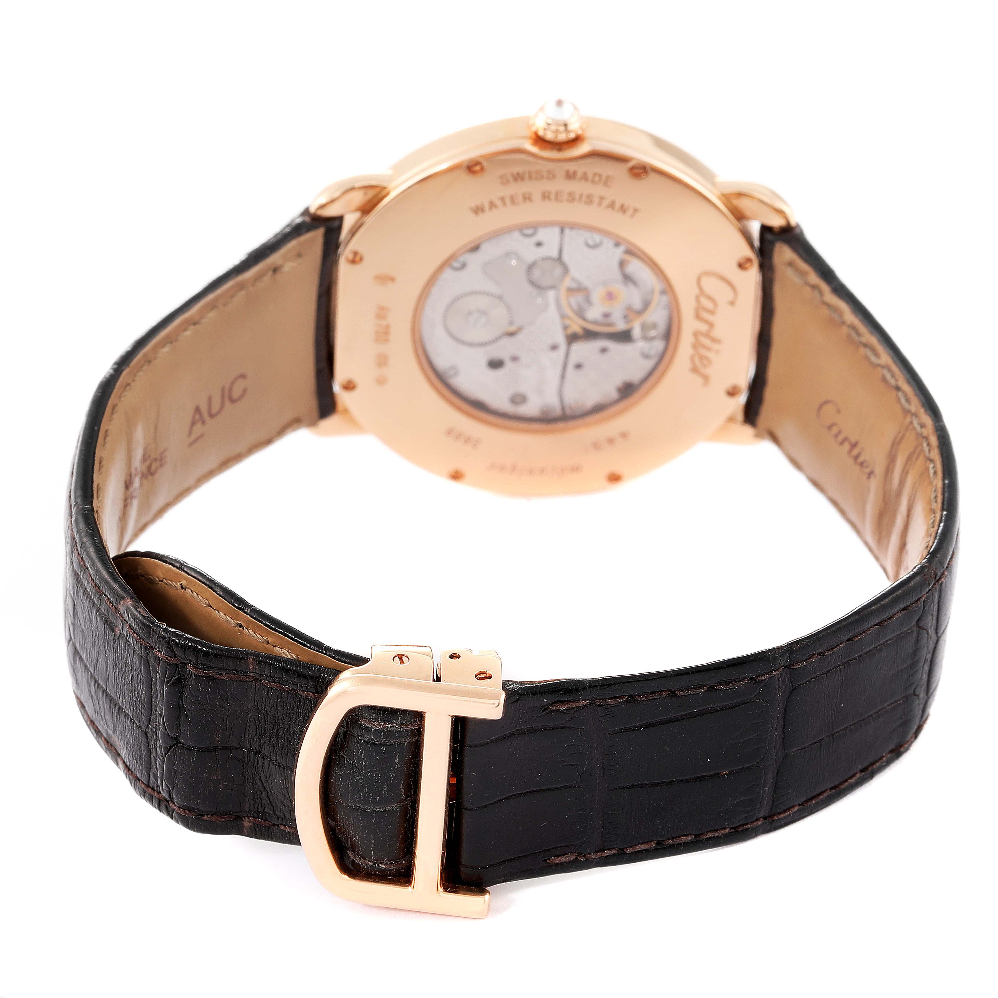 The image shows the back side of the Cartier Ronde WR000651 Men's Rose Gold Silver Dial WR000651 Men's Rose Gold Silver Dial watch, highlighting its leather strap and the transparent case back.